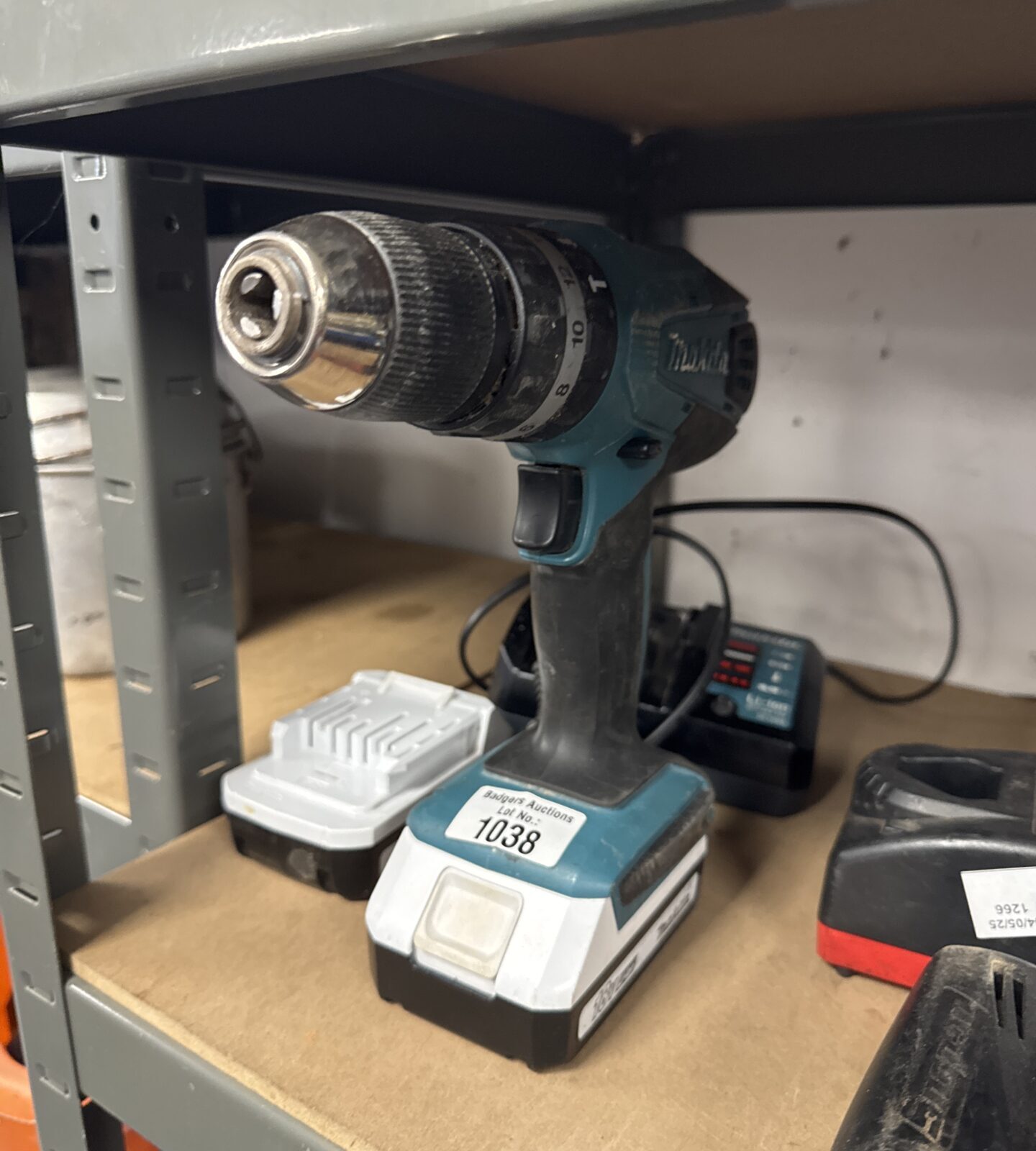 Makita cordless drill with two batteries & charger - untested