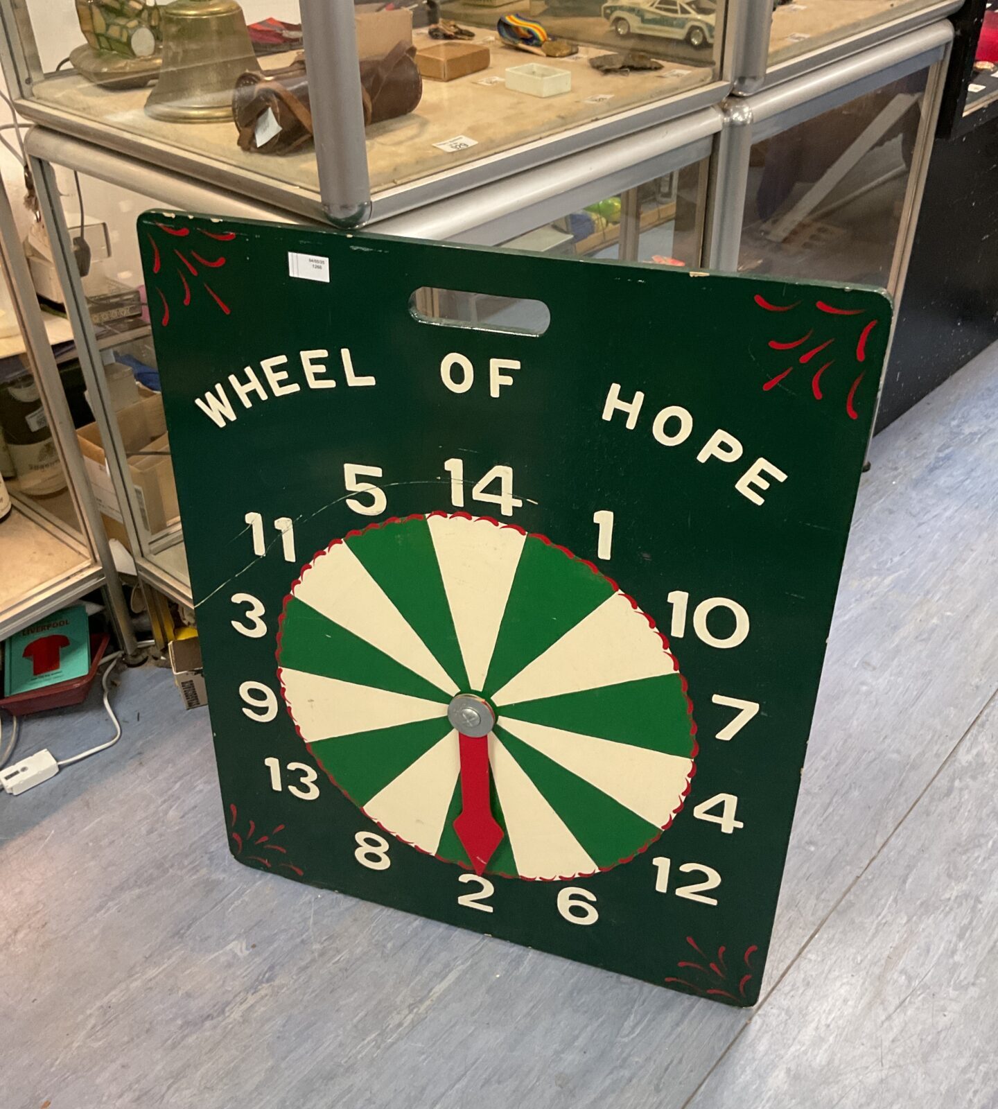 Wooden wheel of hope fair ground board
