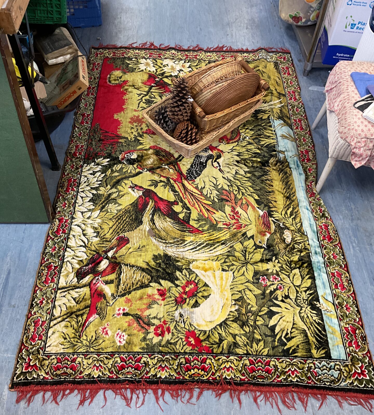 bundle of wicker baskets fir cones & rug