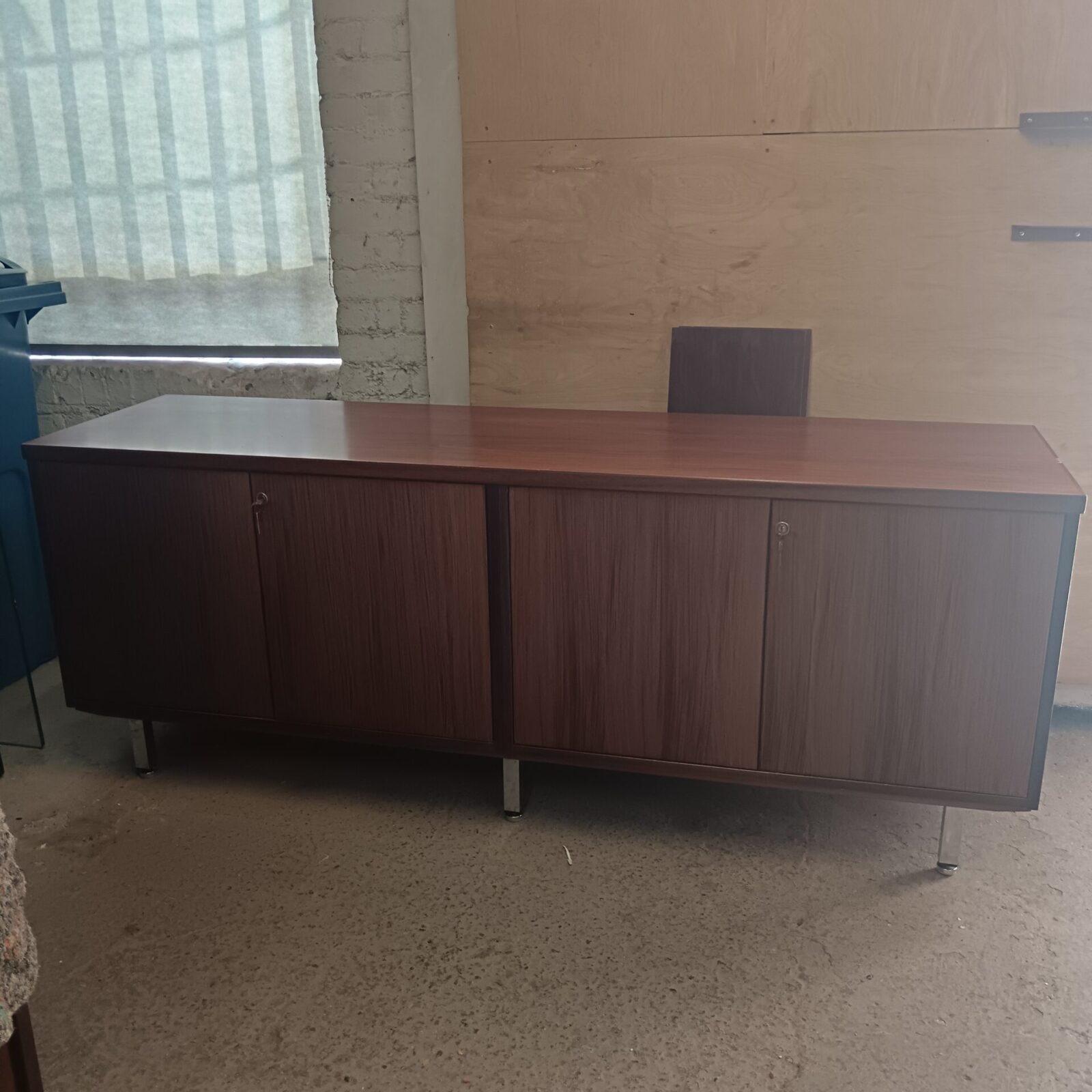 Two vintage storage cabients with keys