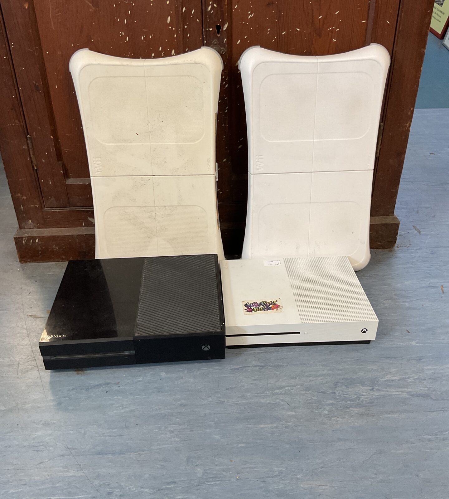 Two xbox consoles inc xbox one and one s with two Nintendo wii boards