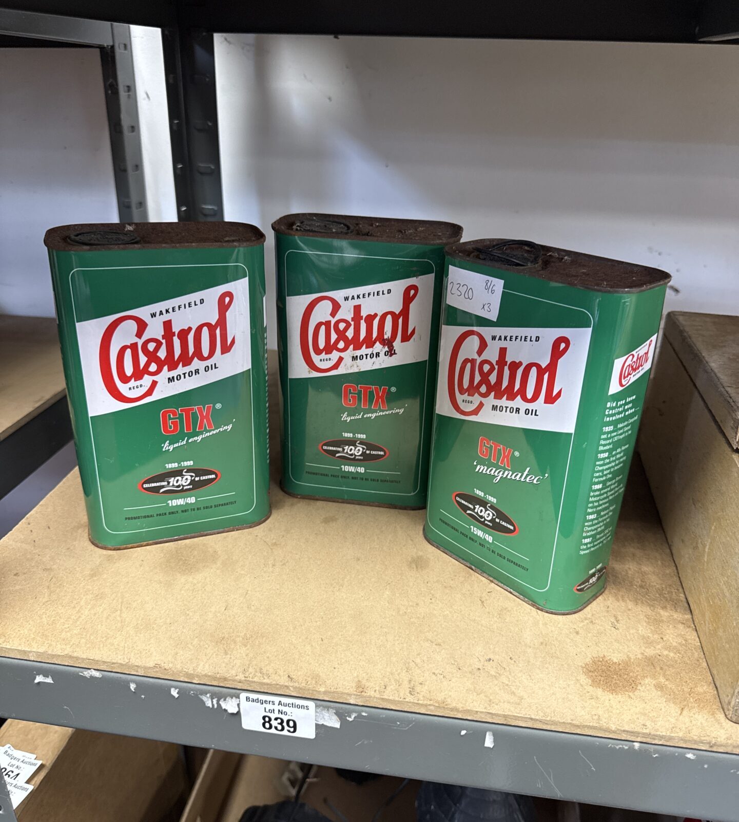 Three vintage castrol gtx 10w/40 oil cans with some contents