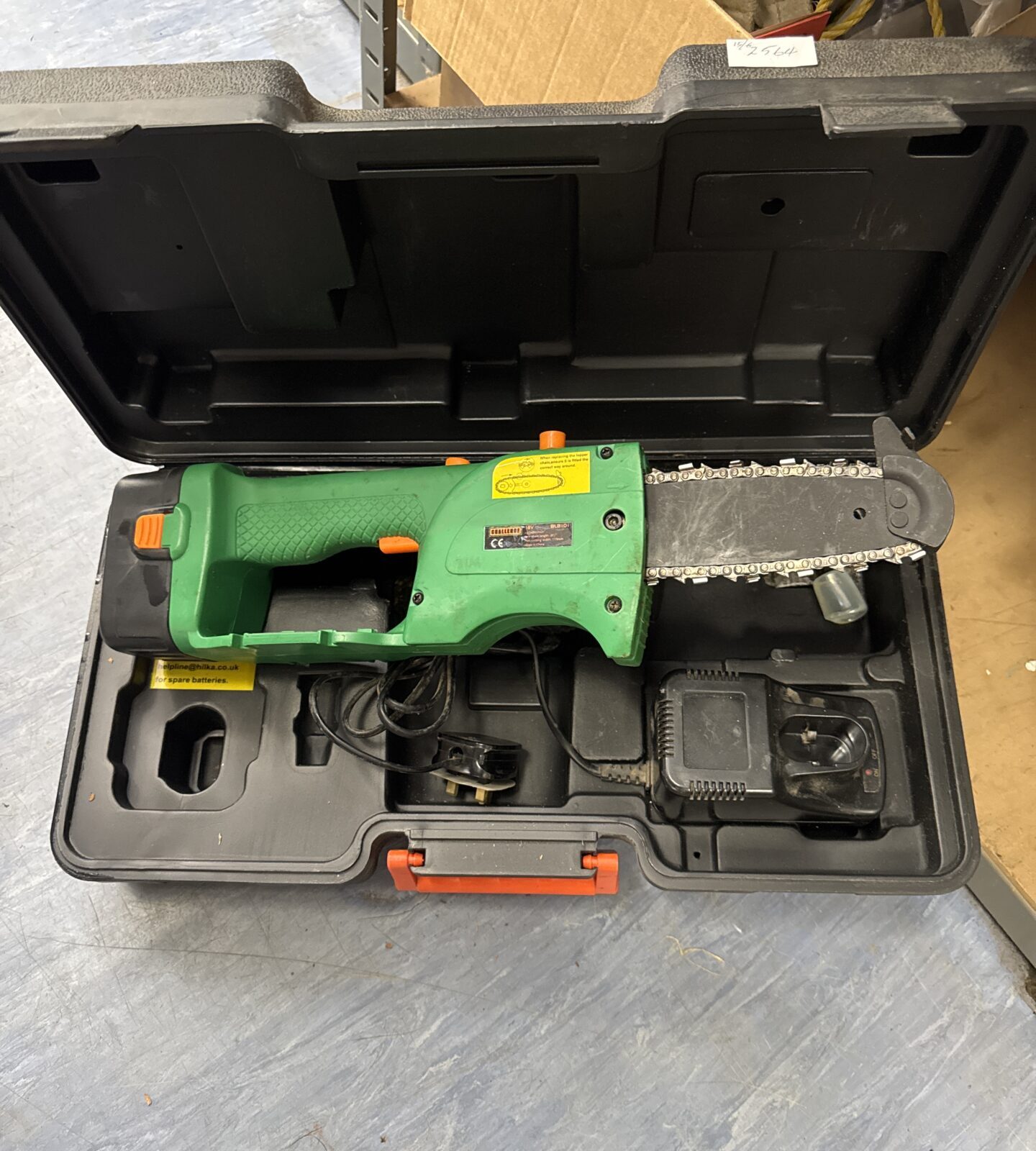 Challenge cordless mini chainsaw with charger - working