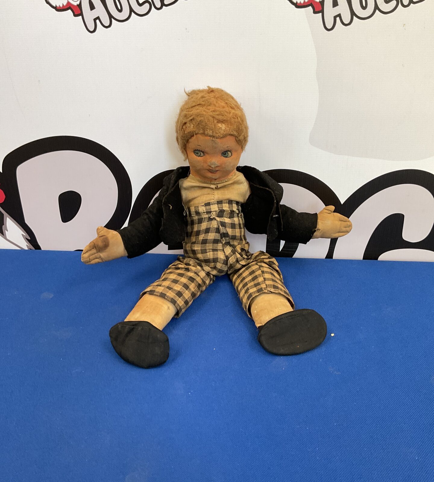 Antique doll with printed fabric