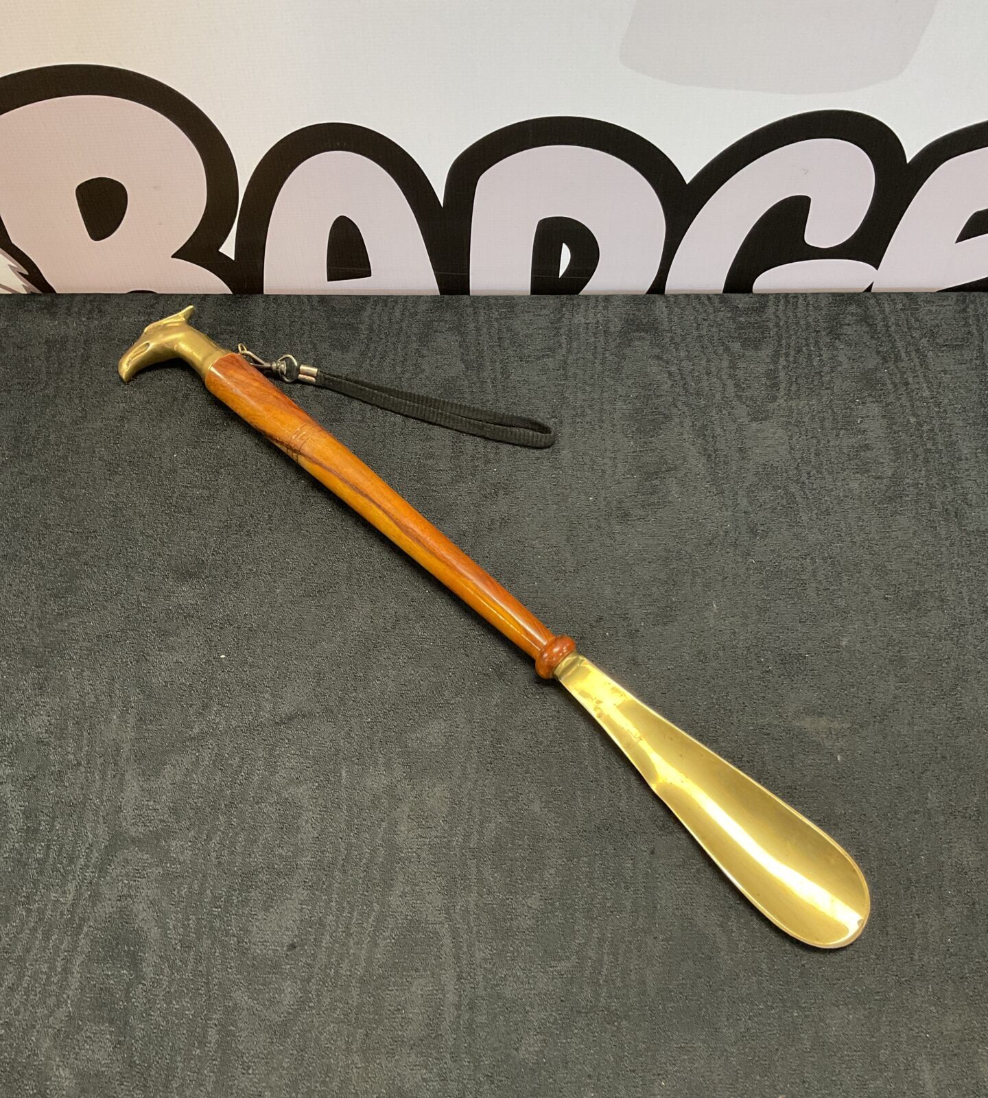 Brass phoenix head shoe horn