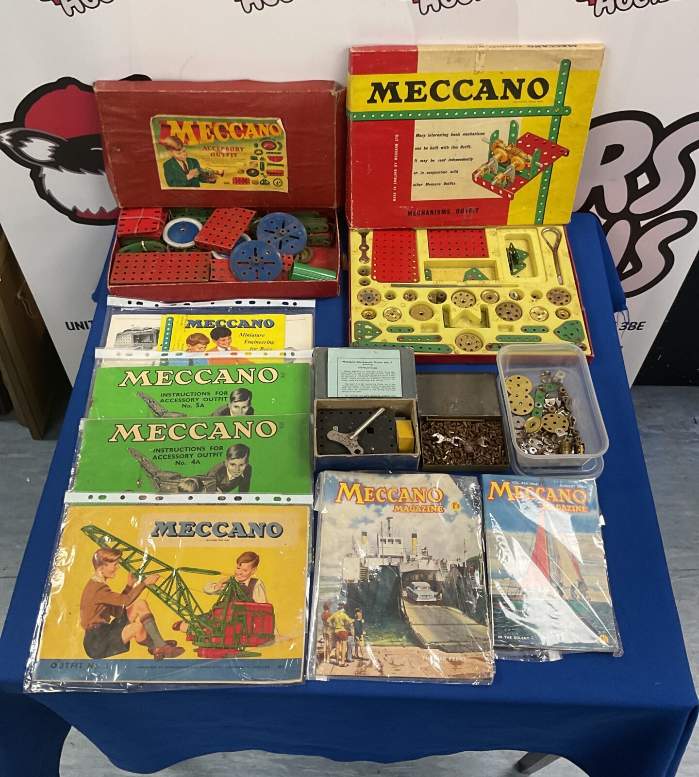 Box of mixed vintage meccano inc boxed sets, manuals and clockwork motor