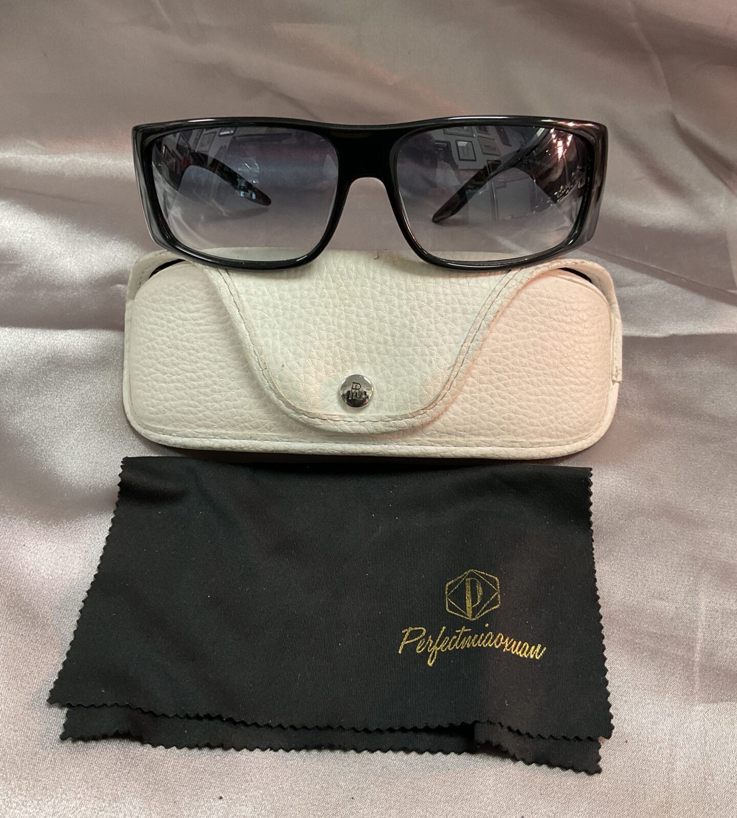 Pair of polo Ralph Lauren sun glasses with case