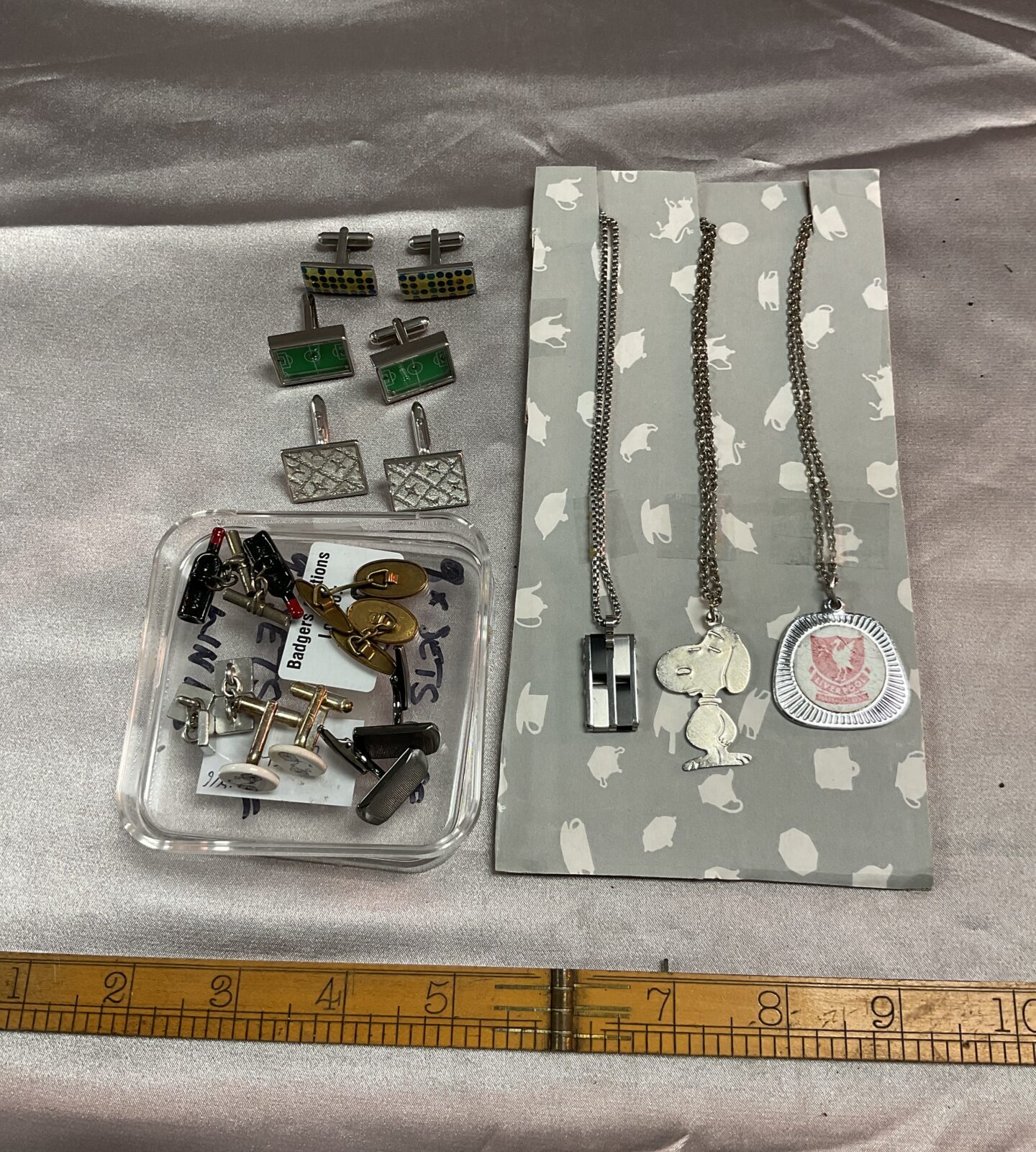 8 sets of cufflinks & three pendant chains