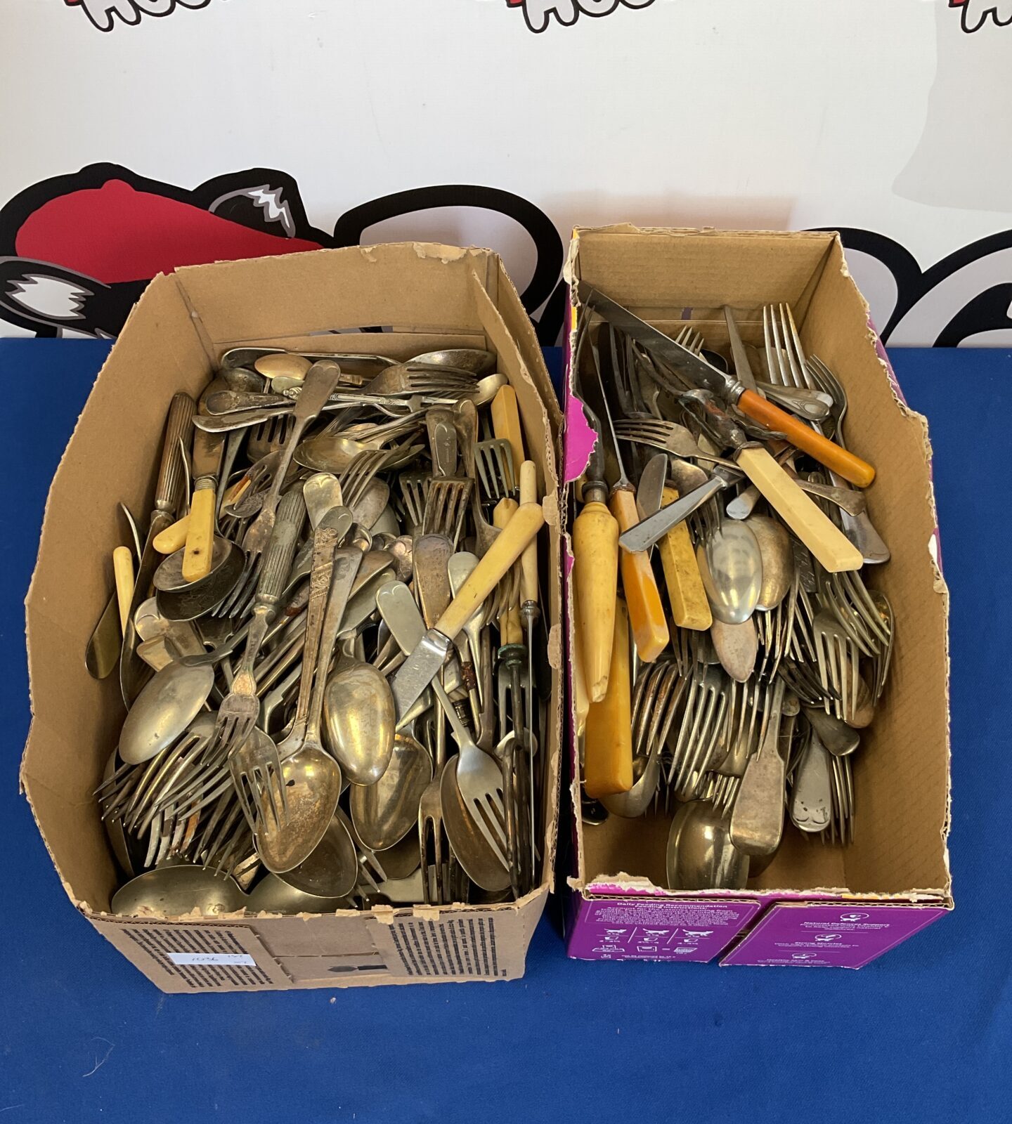 Two boxes of silver plate cutlery