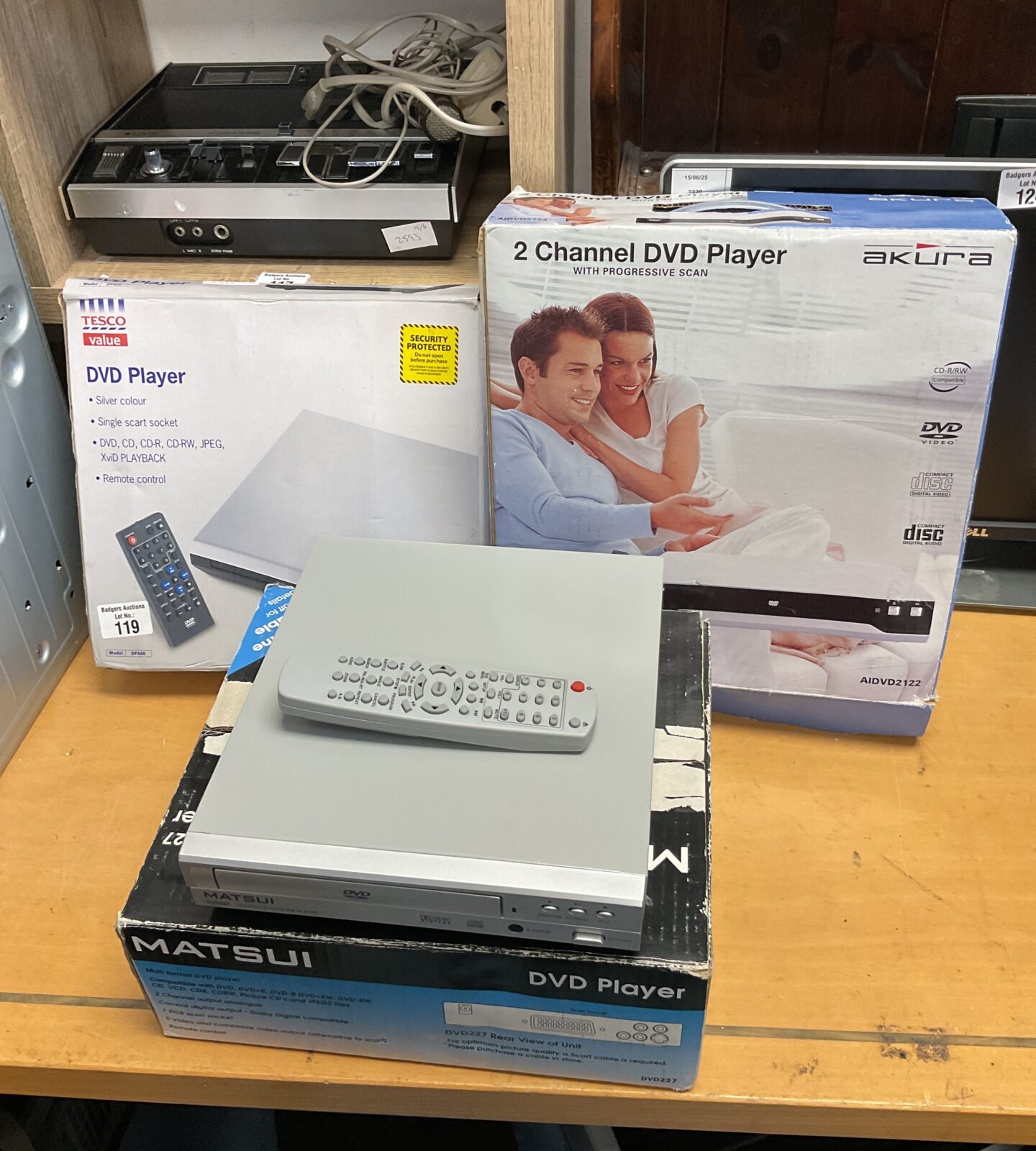 Three boxed dvd players inc matsui & akura