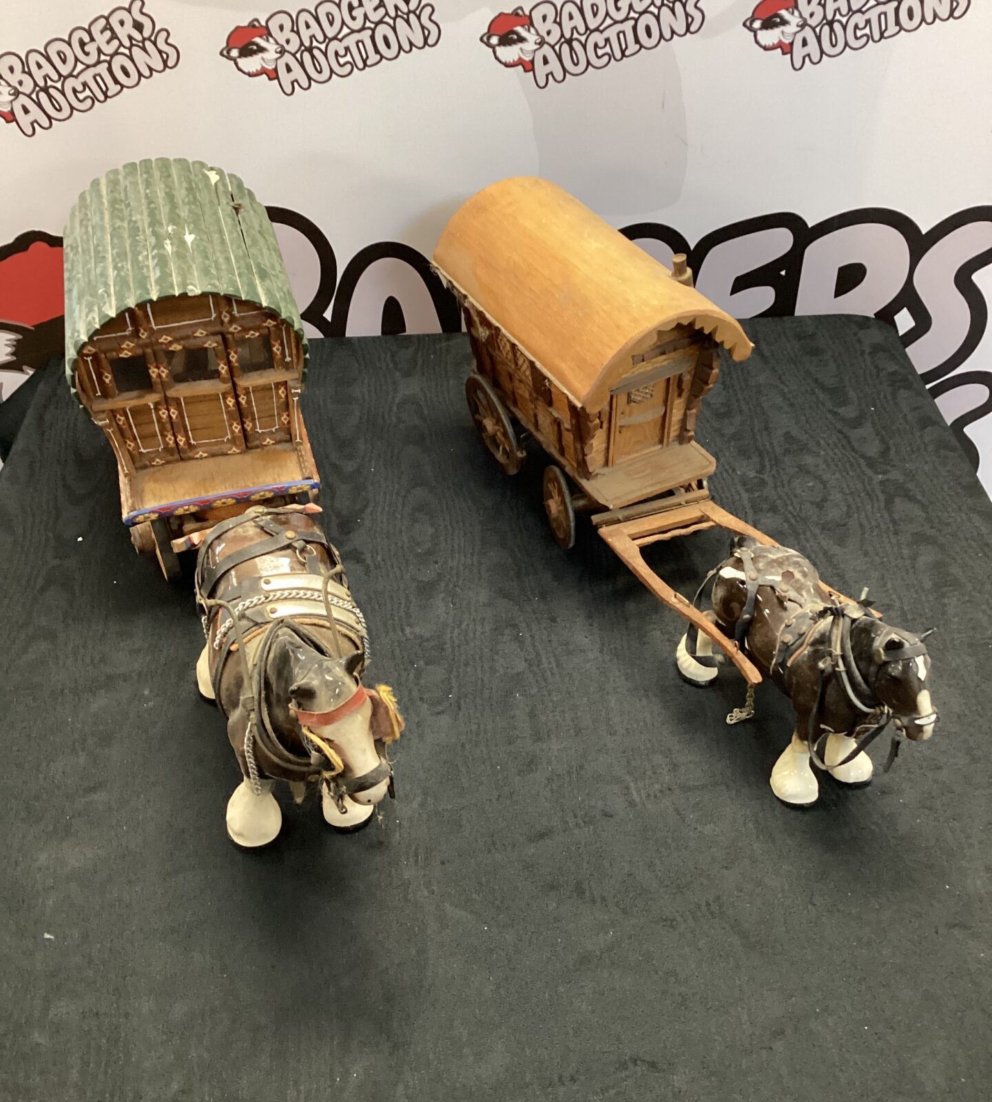 Two ornamental shire horses with two romany caravans