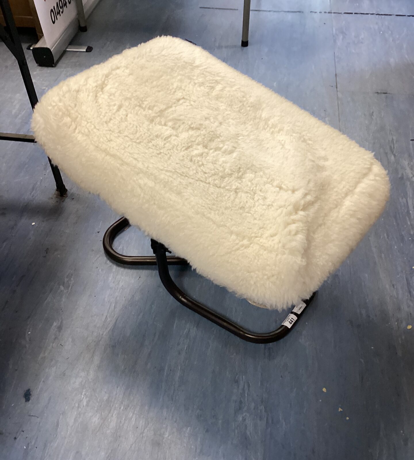 Spring loaded footstool