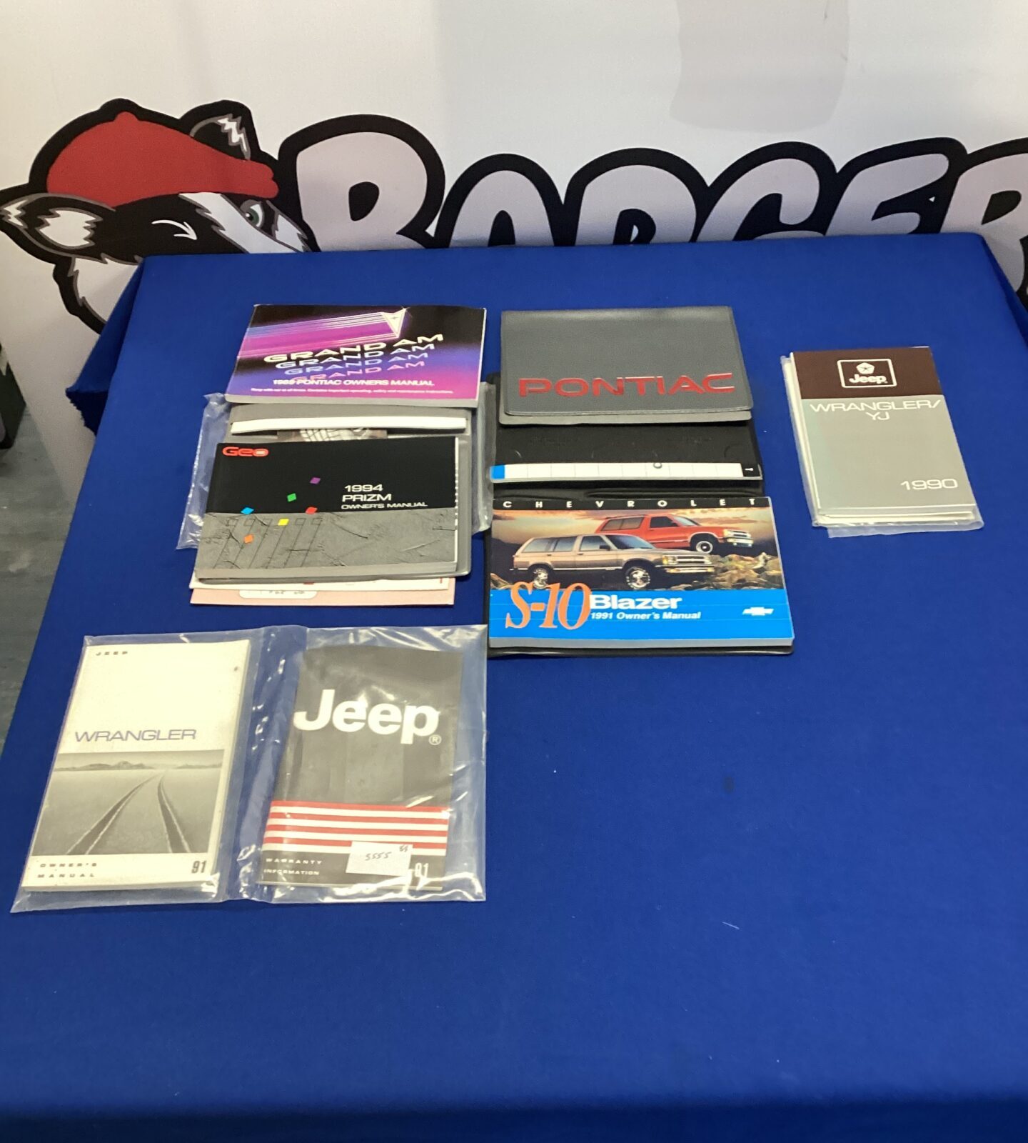 Collection of American Car owners manuals inc 1989 pontiac & jeep