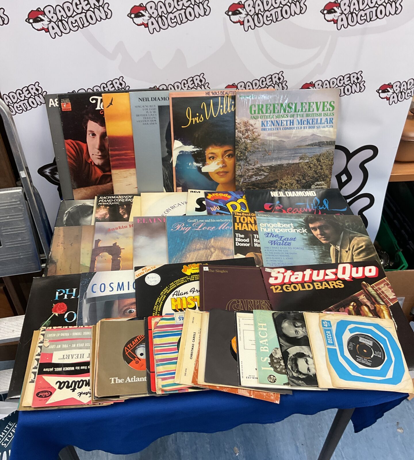 Collection of 12” & 7” vinyl records including status quo