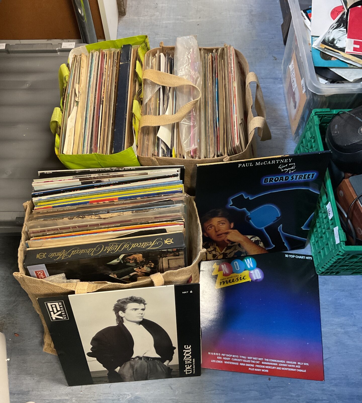 Three bags of 12” vinyl records inc paul mccartney
