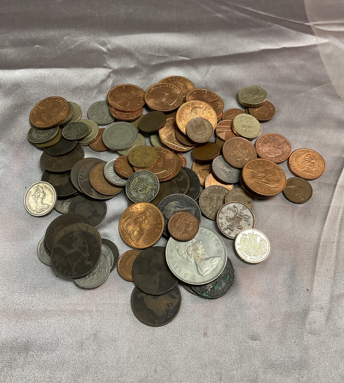 Tub of assorted coins