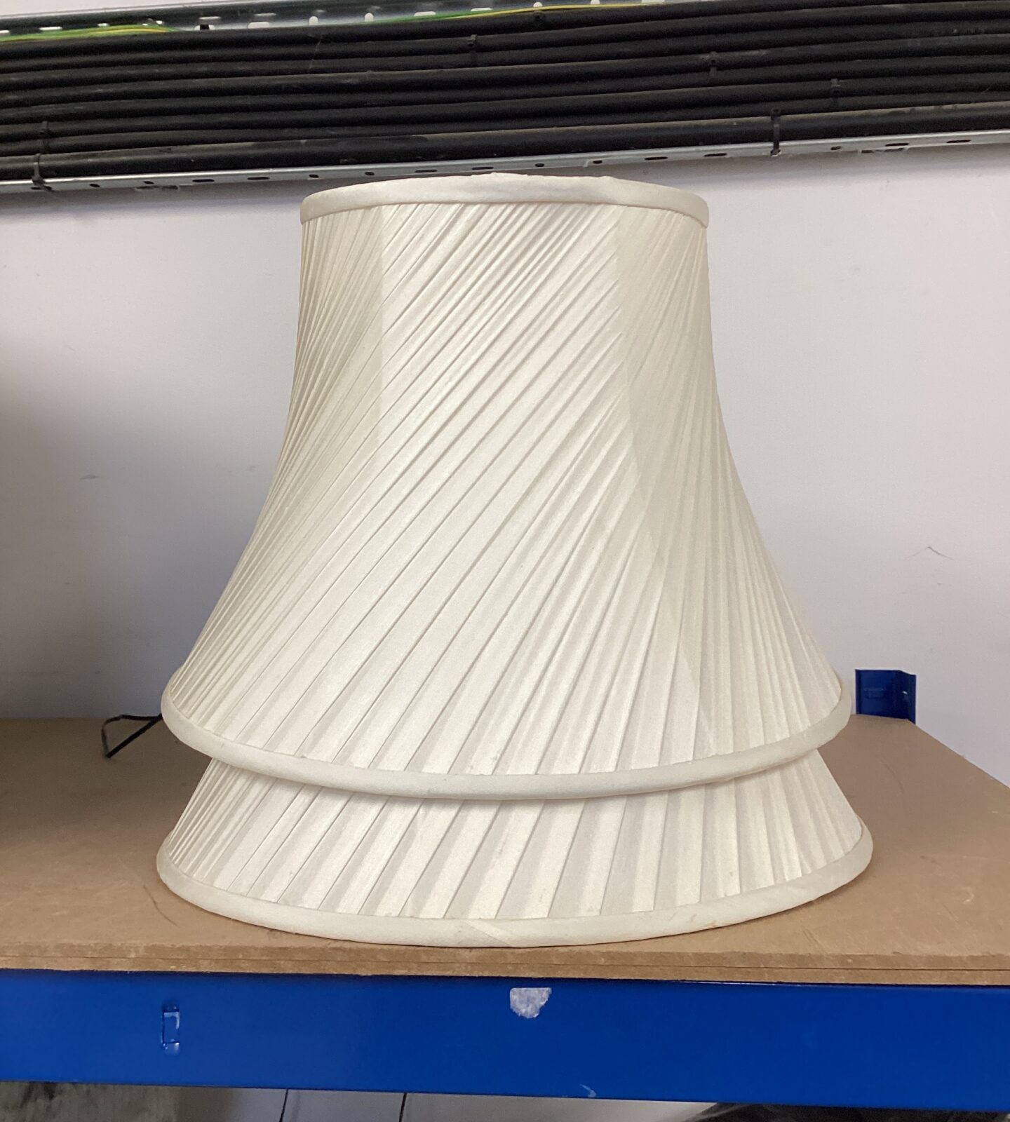 Two cream lamp shades