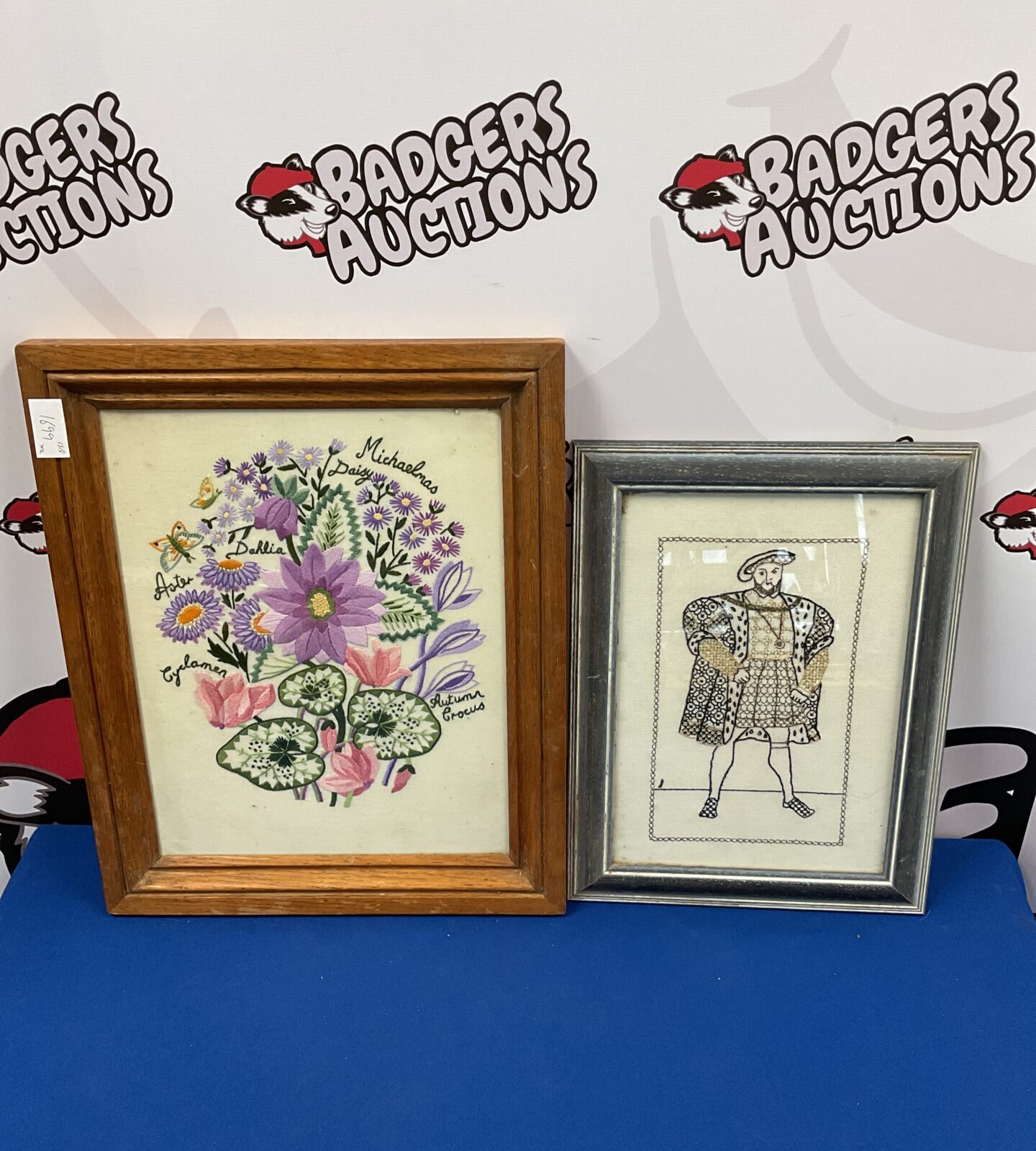 Two framed embroideries including still life & henry viii