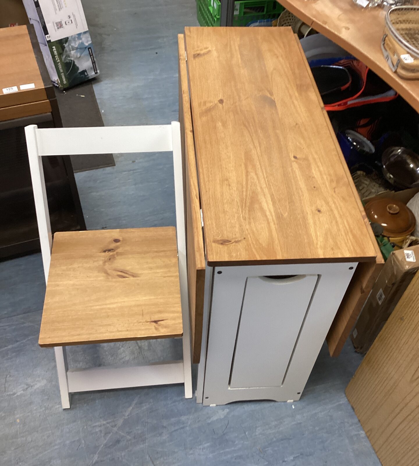 Pine drop leaf compact table complete with four folding chairs