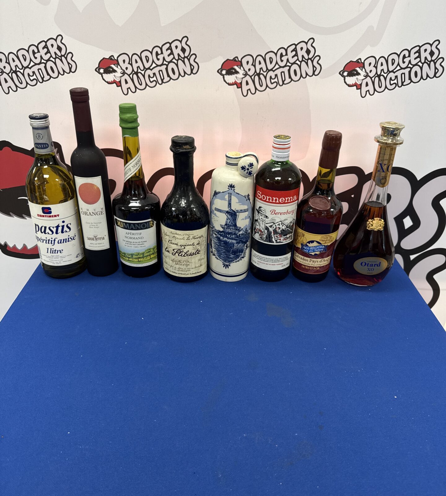 Selection of bottles of alcohol inc cognac & others