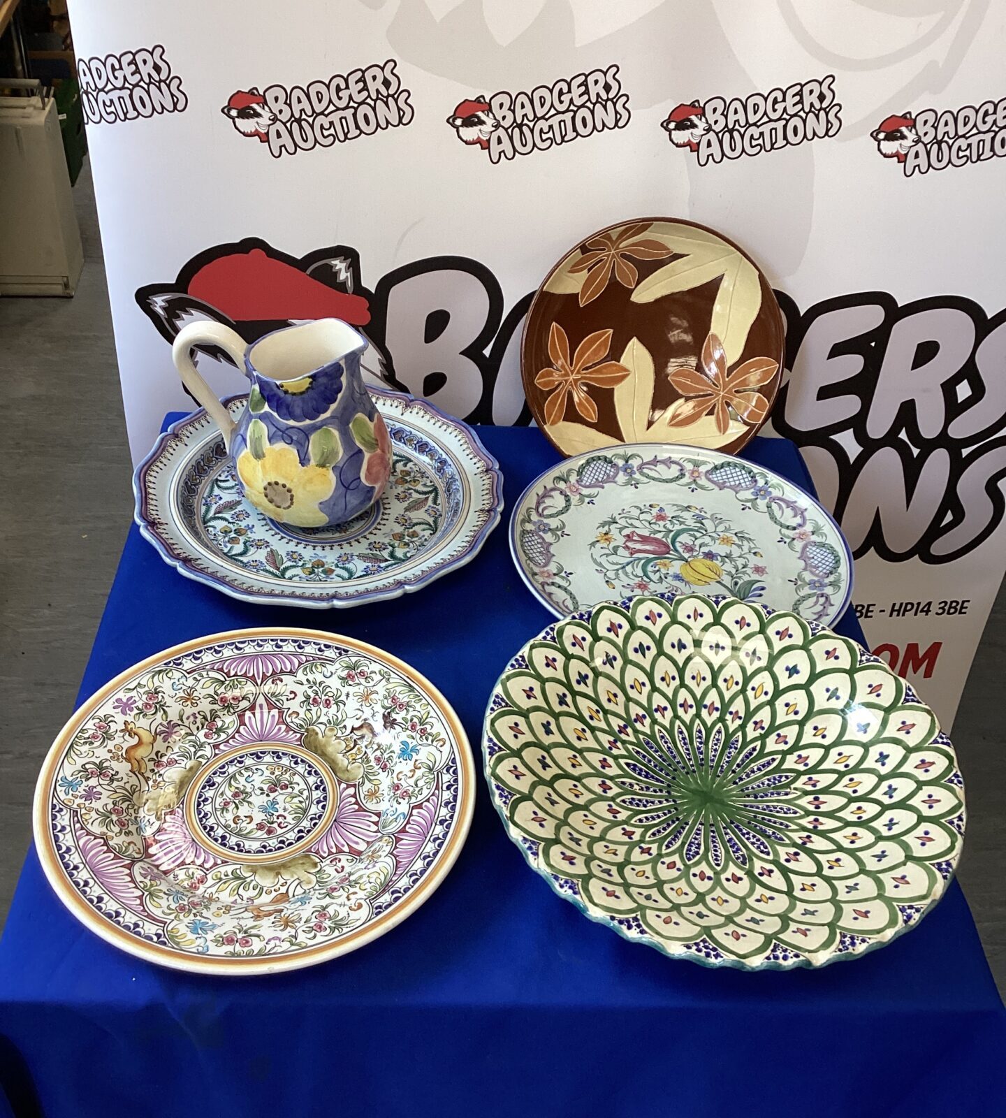 Selection of large decorative plates with jug