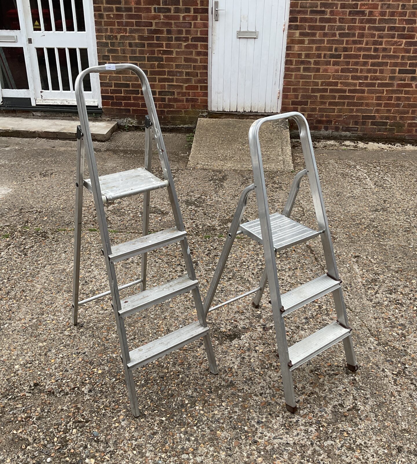 Two aluminium step ladders