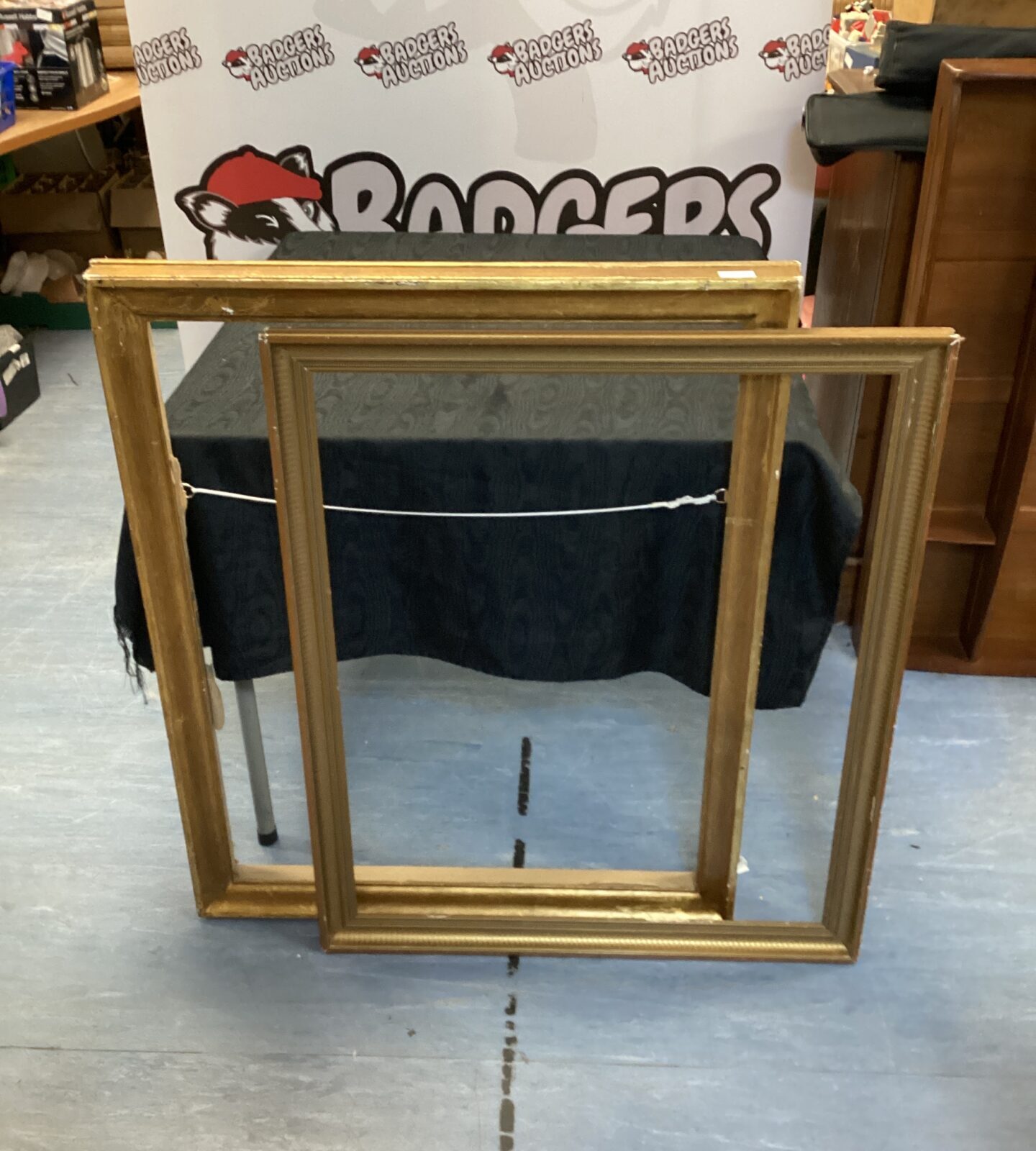 Two large vintage wooden picture frames one English one french