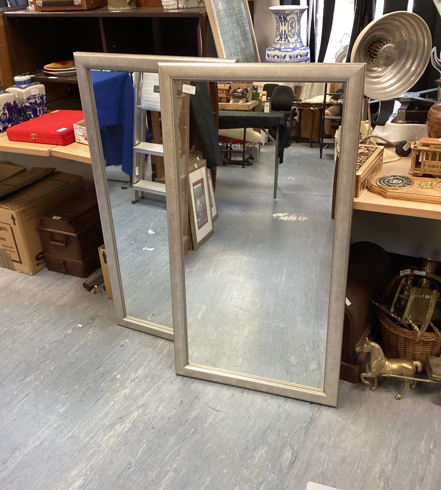 Two rectangular wall mirrors