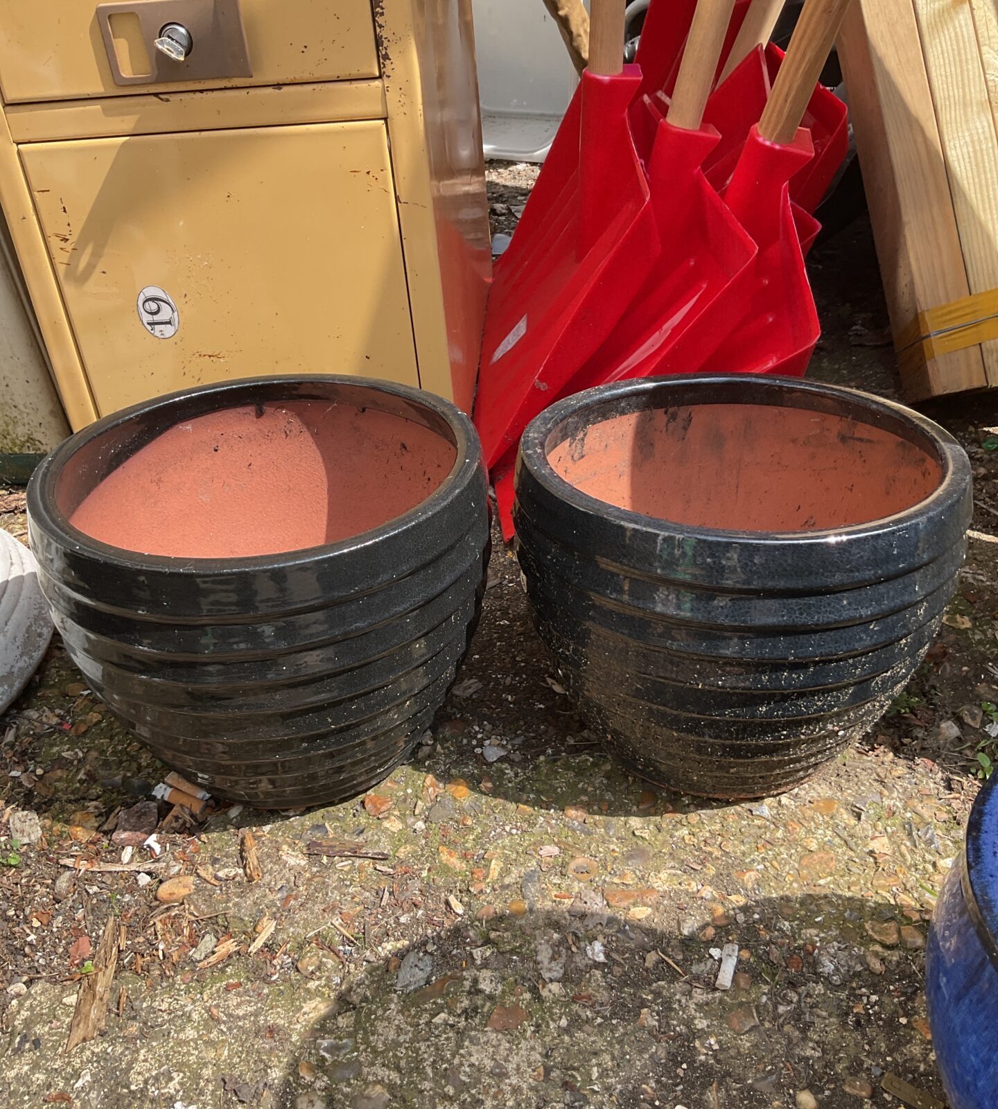 Pair of matching black plant pots