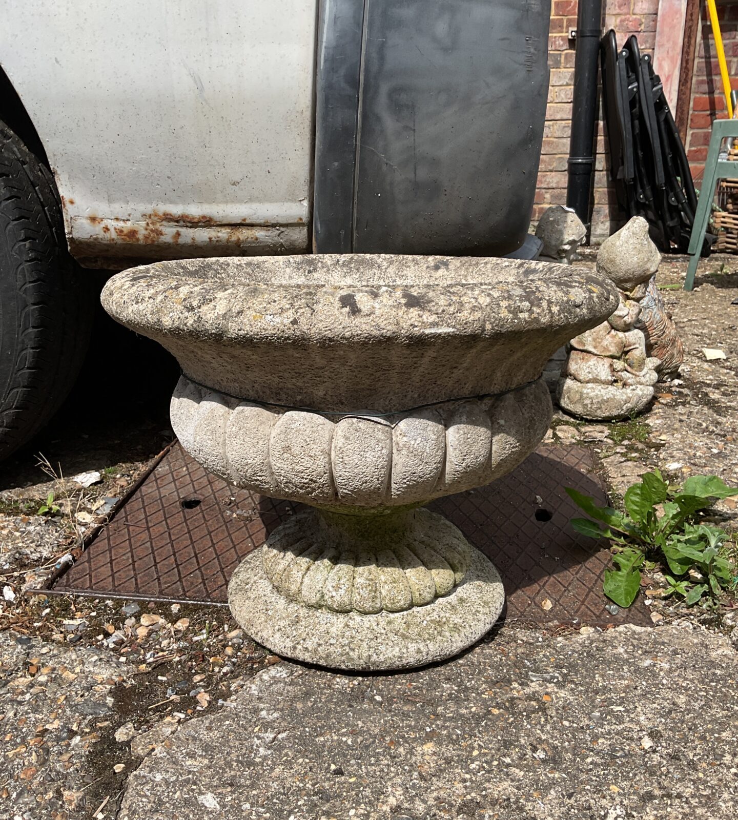Concrete pedestal urn planter