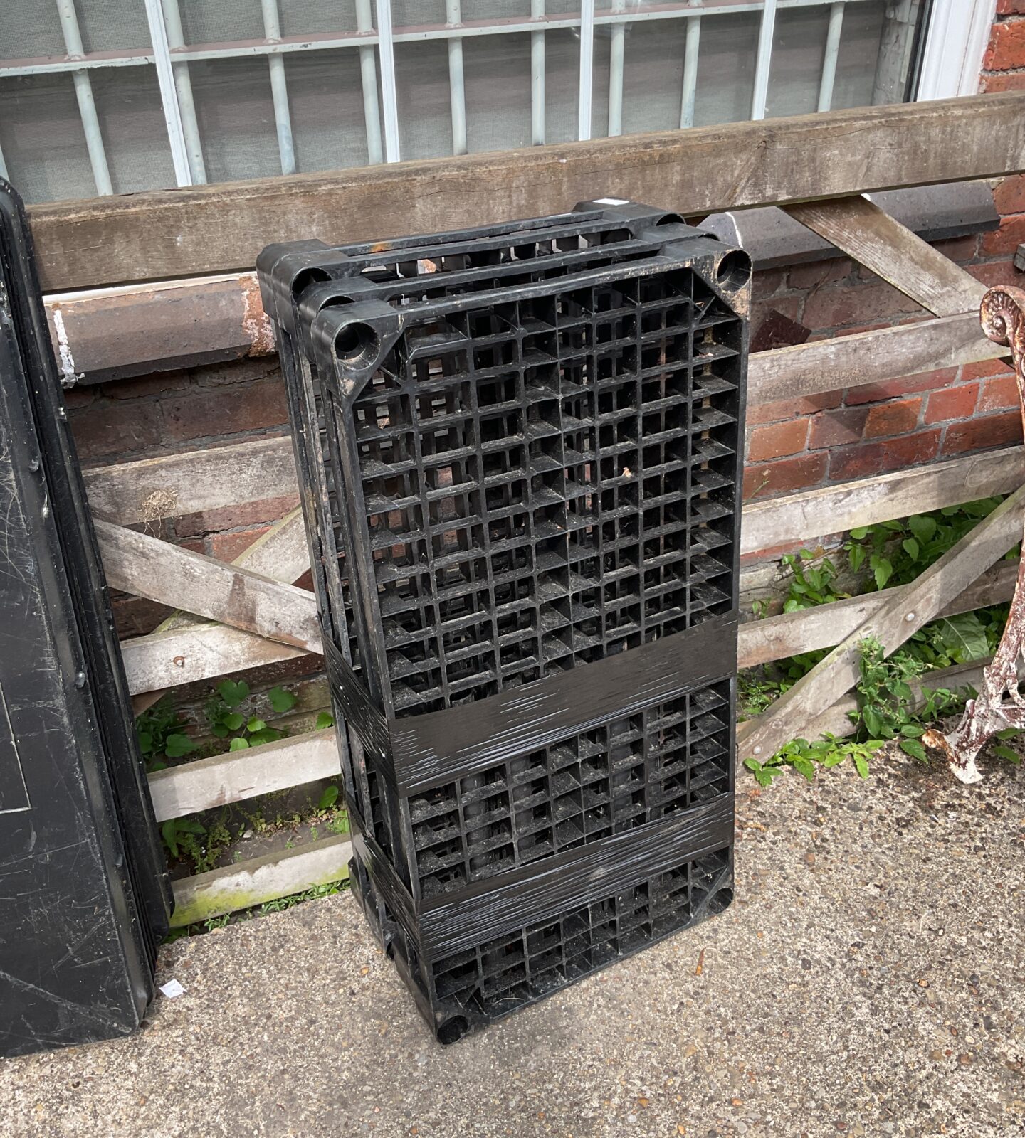 Black plastic shelving unit