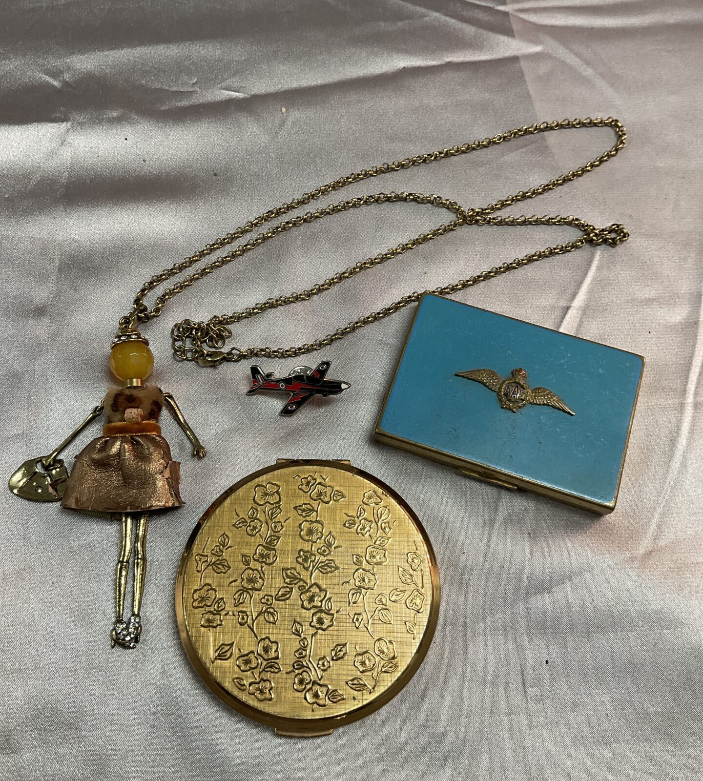 tray vintage to include raf powder compact and articulated pendant and Stratton compact