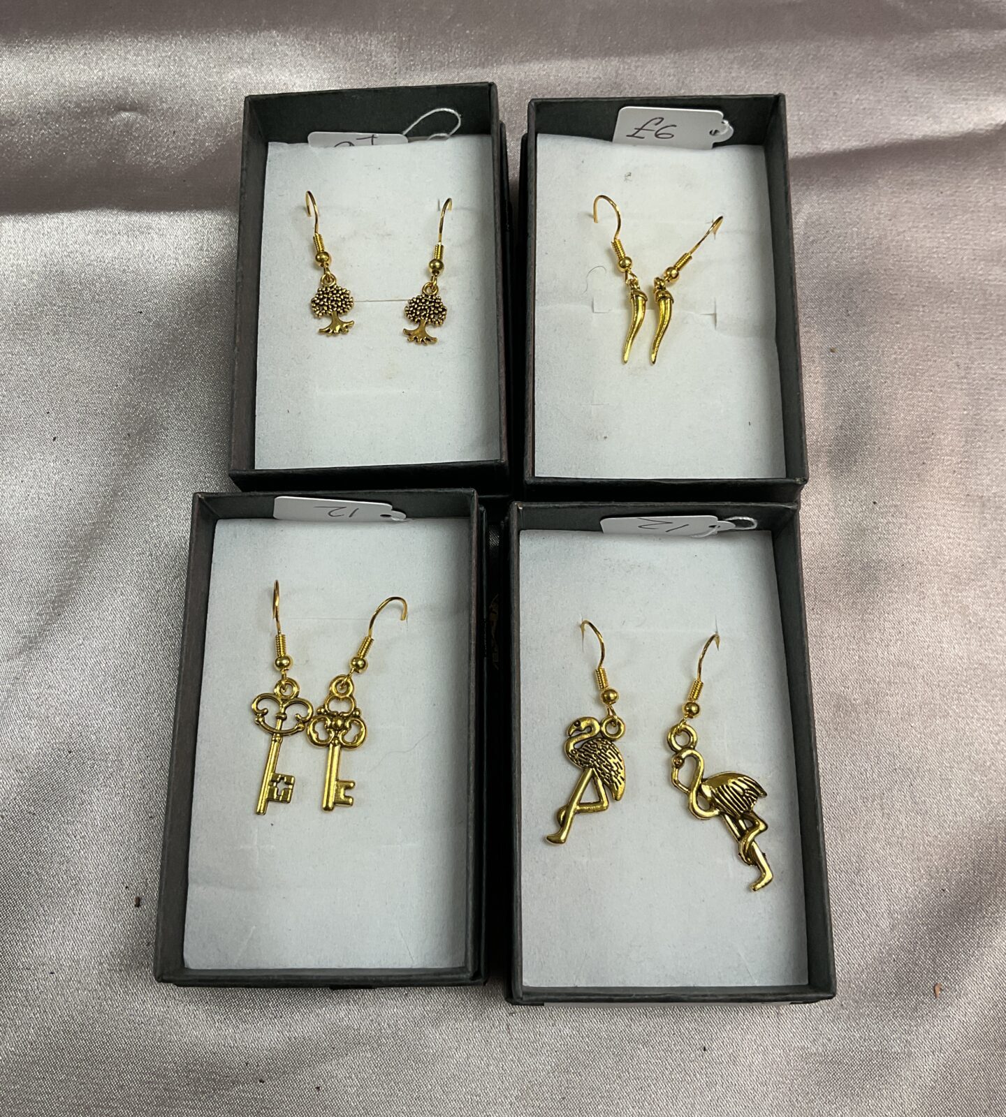Four pairs silver gilt earrings