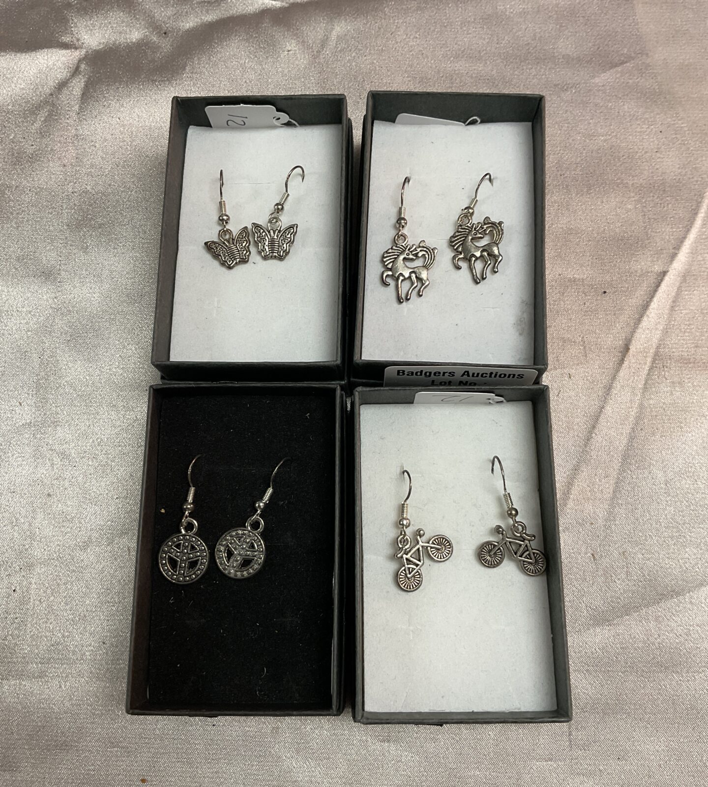 Four pairs silver earrings