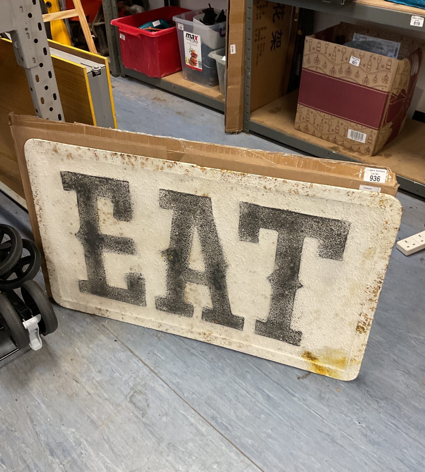 Large metal eat sign