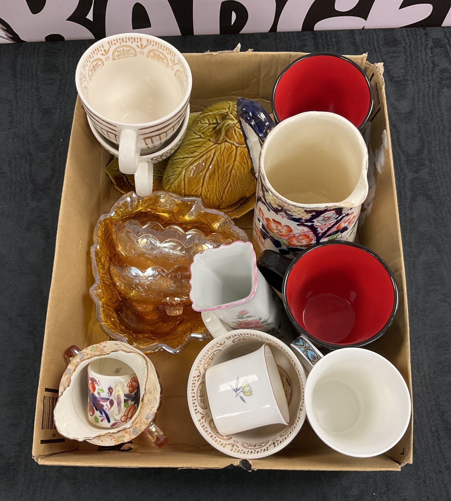 Box of assorted China Inc carnival ware