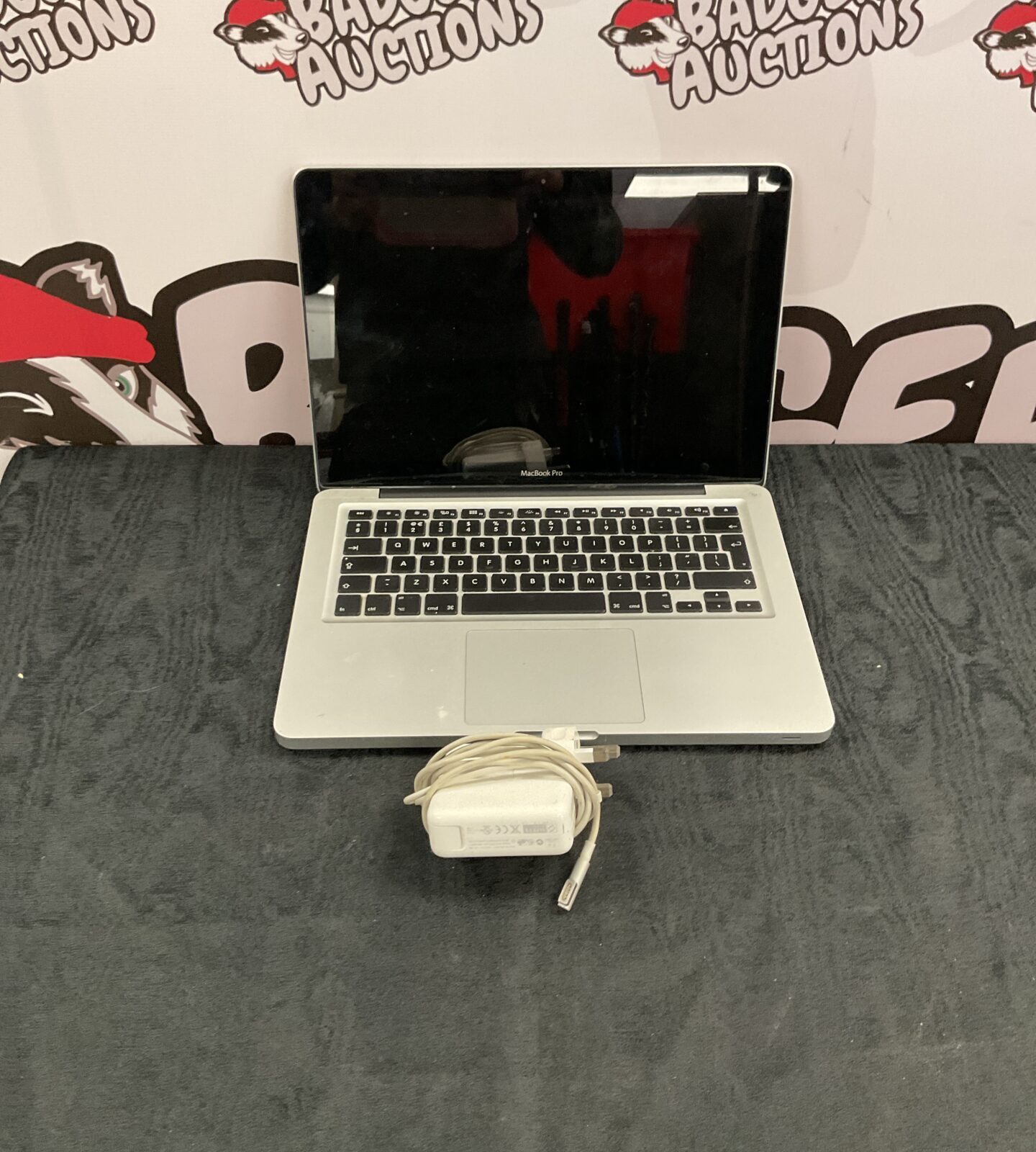 Apple macbook pro model A1278 With Charger Untested