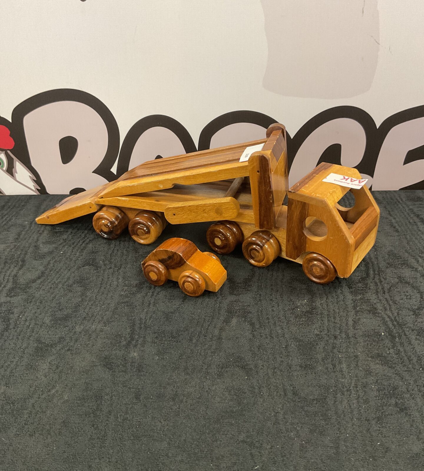 Handmade wooden car transporter with car