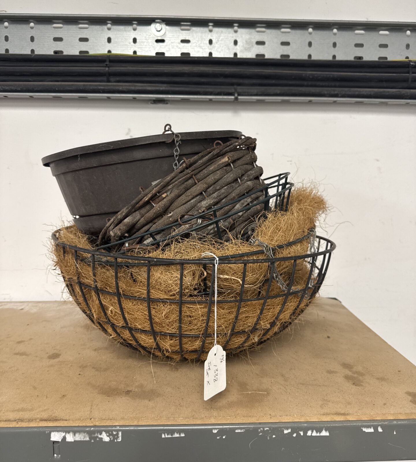 Six assorted hanging flower baskets