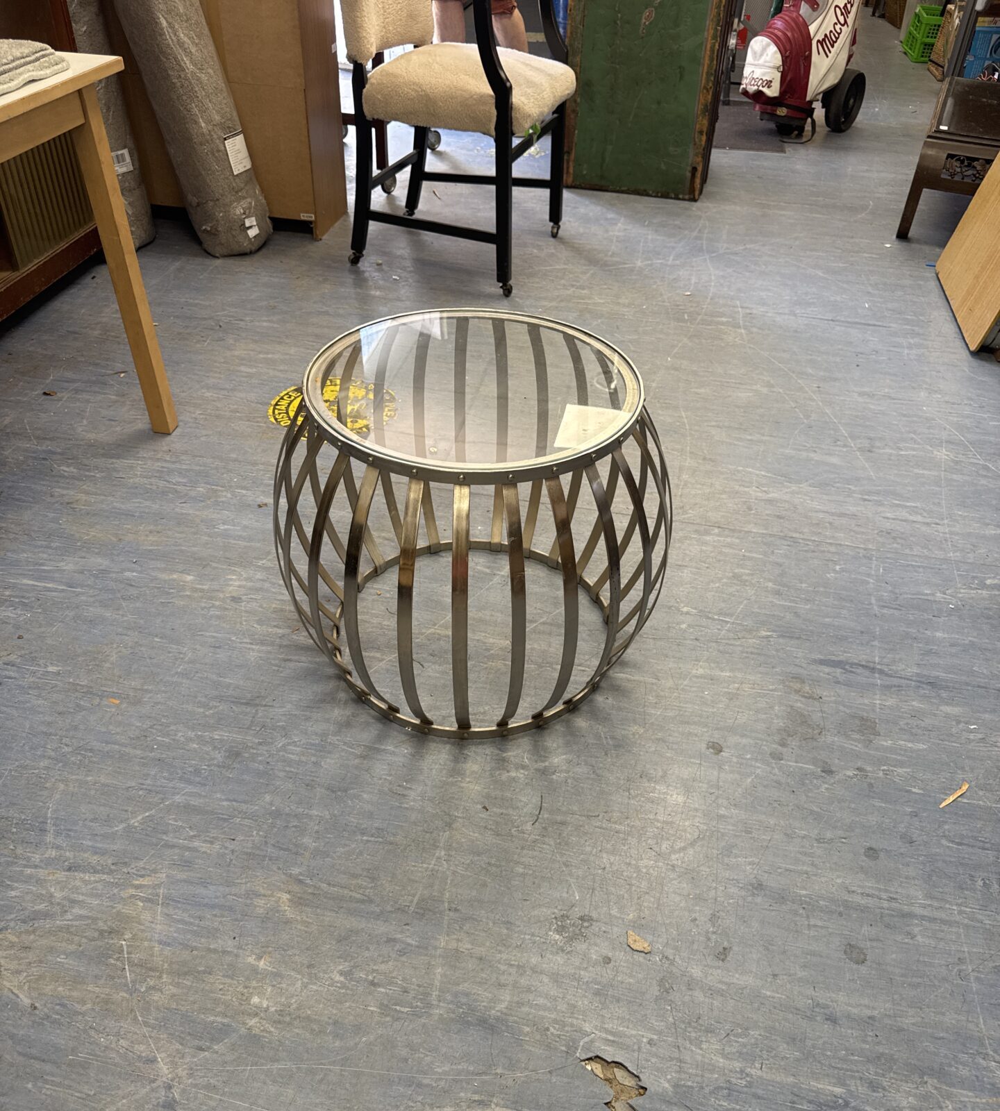 Stainless steel framed glass top barrel shaped side table 18.5” tall