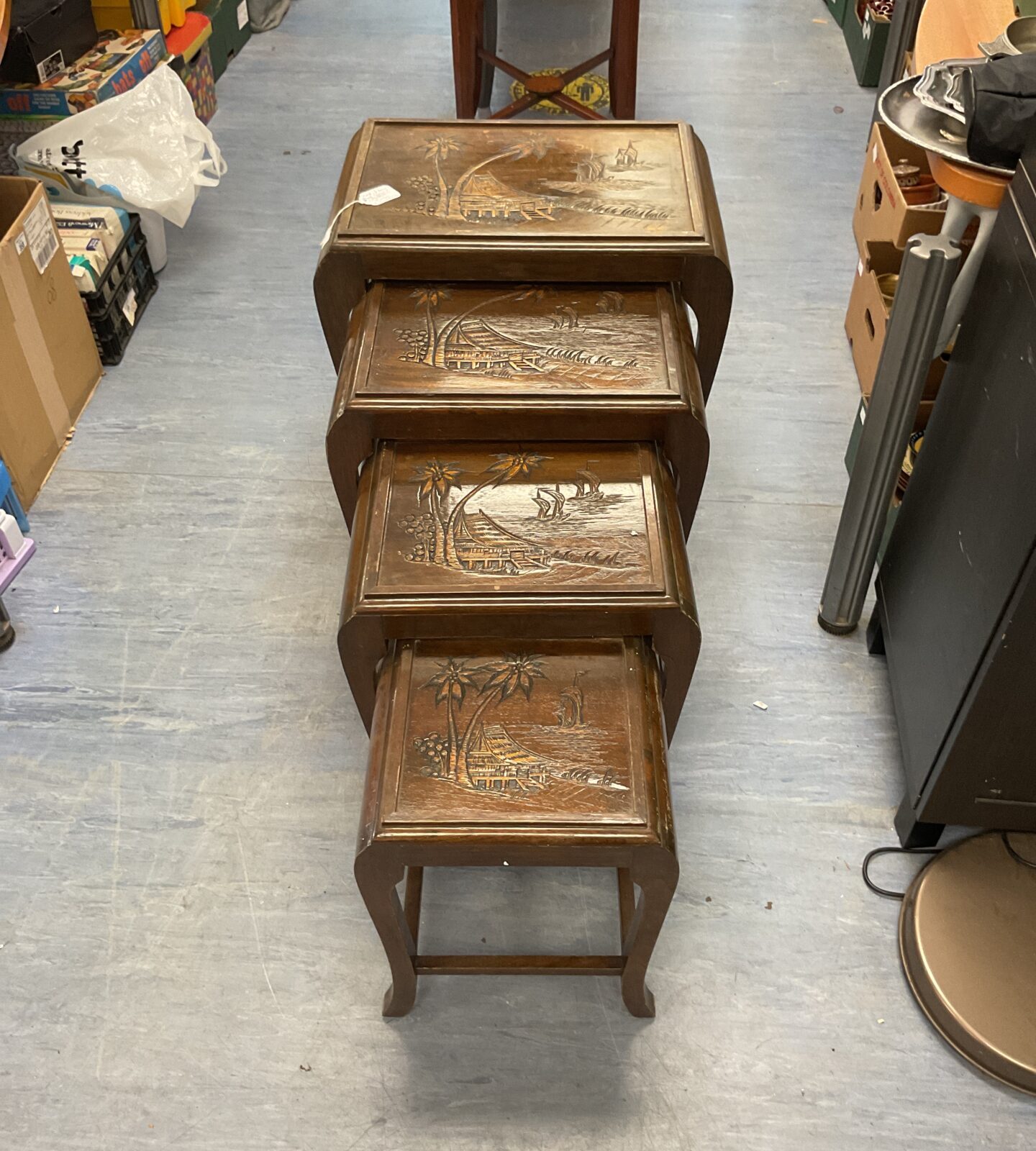 Early 20th Century Nest Of Four Hand Carved Antique Oriental Tables