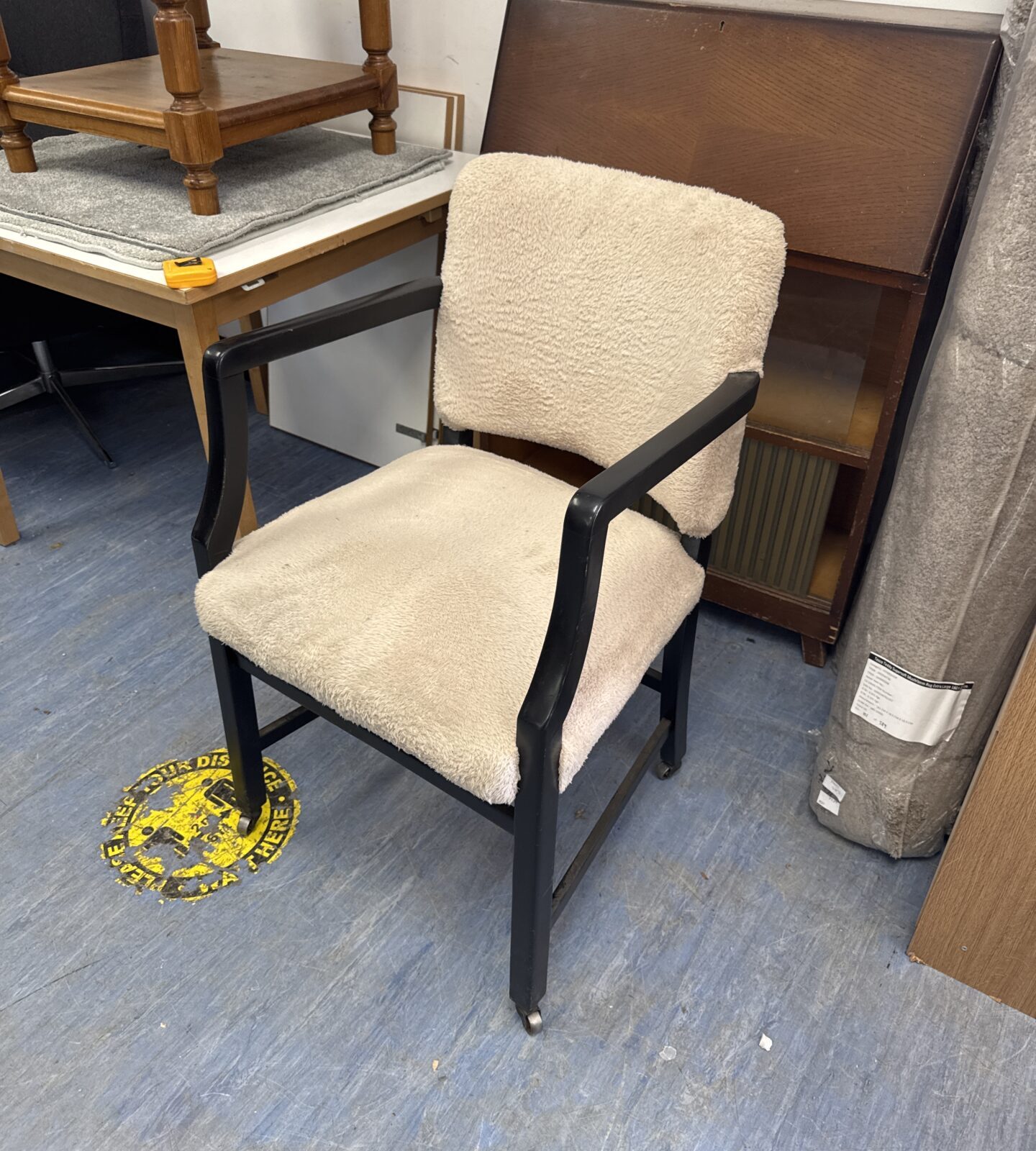 Vintage faux fur armchair on castor wheels