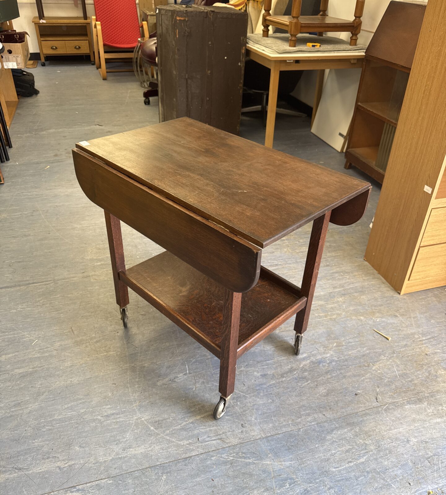 Vintage mahogany wheeled drop leaf table 30” length