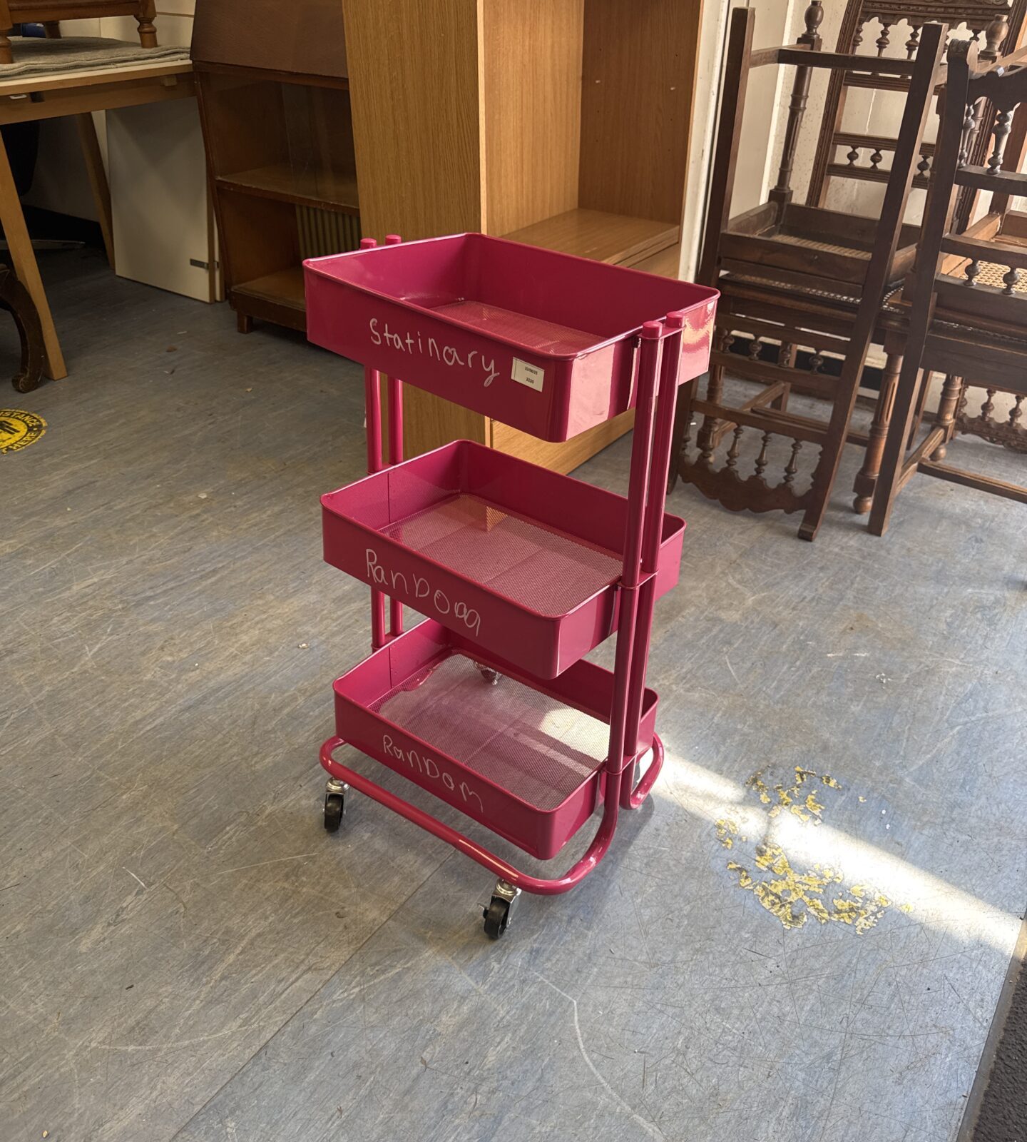 Three tier wheeled metal storage unit - frame slightly twisted, needs straightening