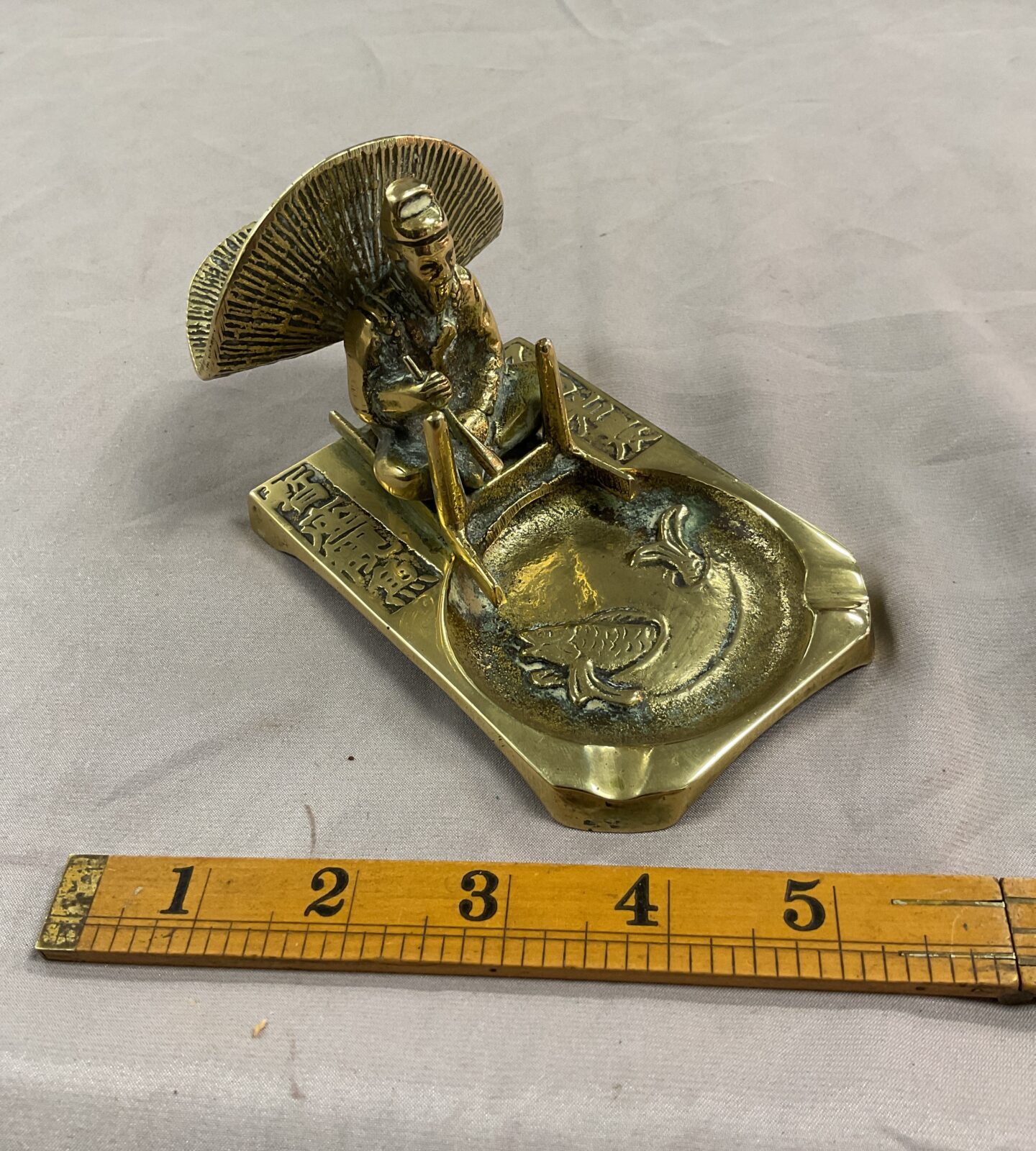 oriental brass fisherman ash tray