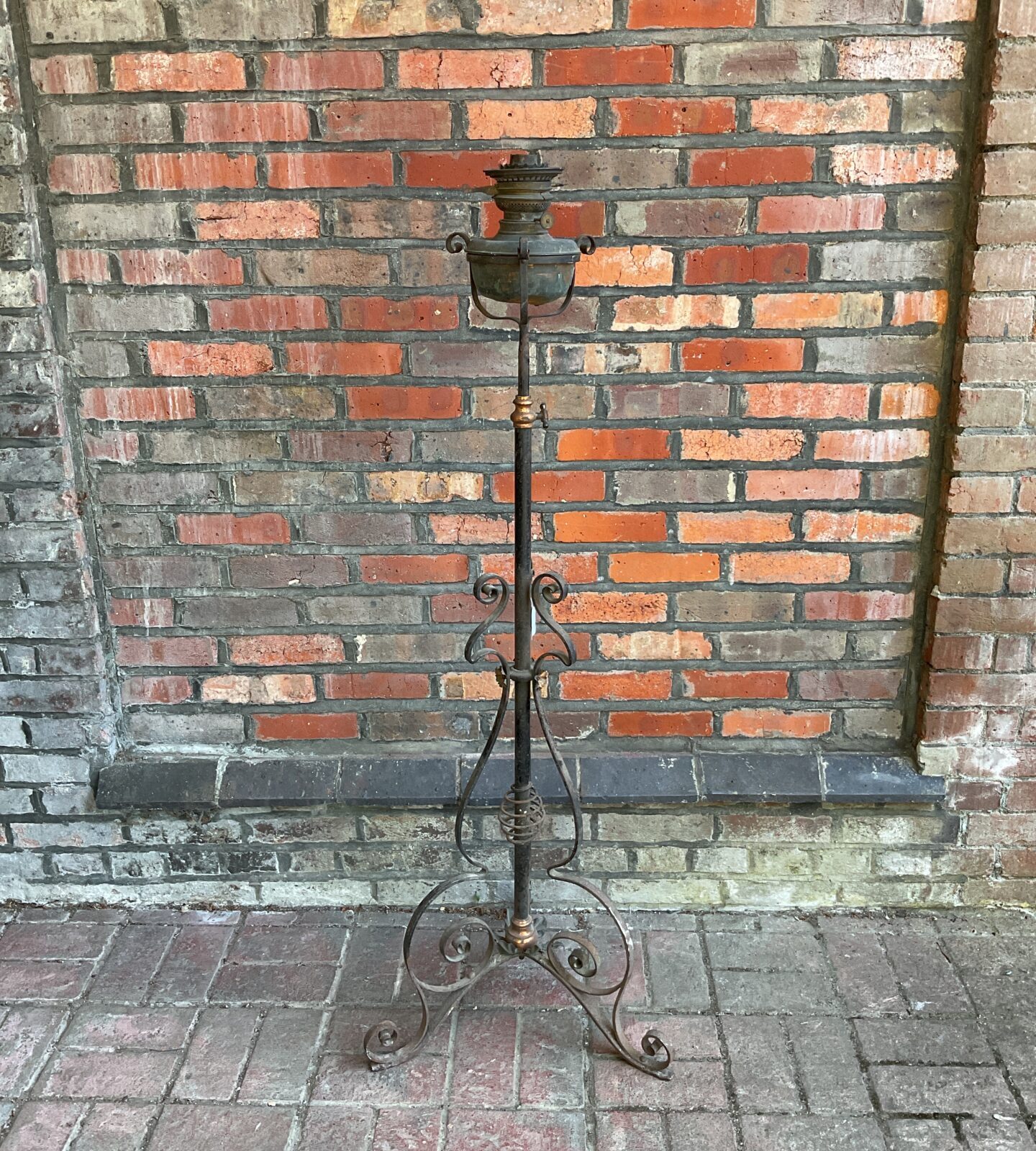 Vintage globe vulcan german made oil lamp on wrought iron stand