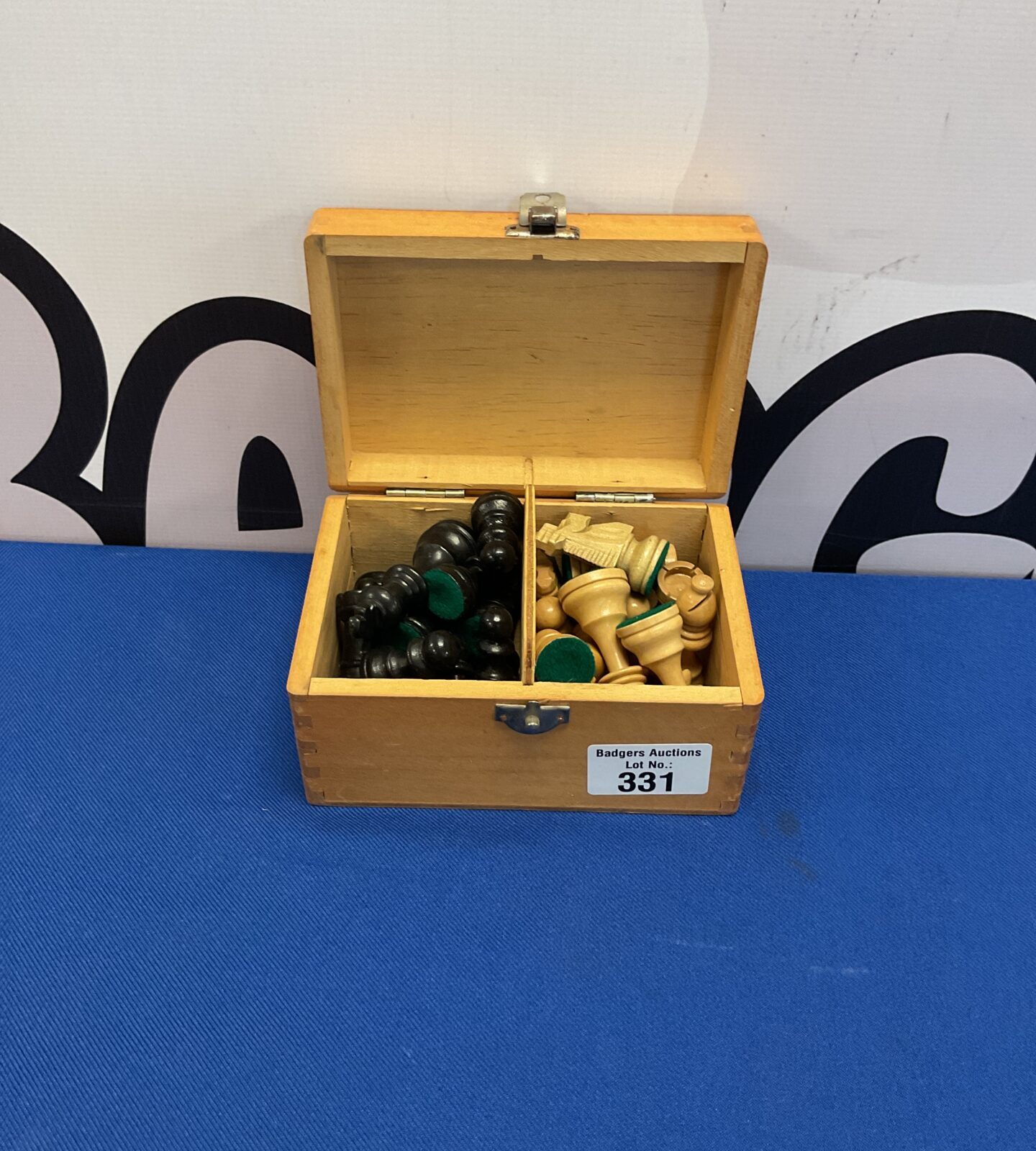 Small wooden box of wooden chess pieces