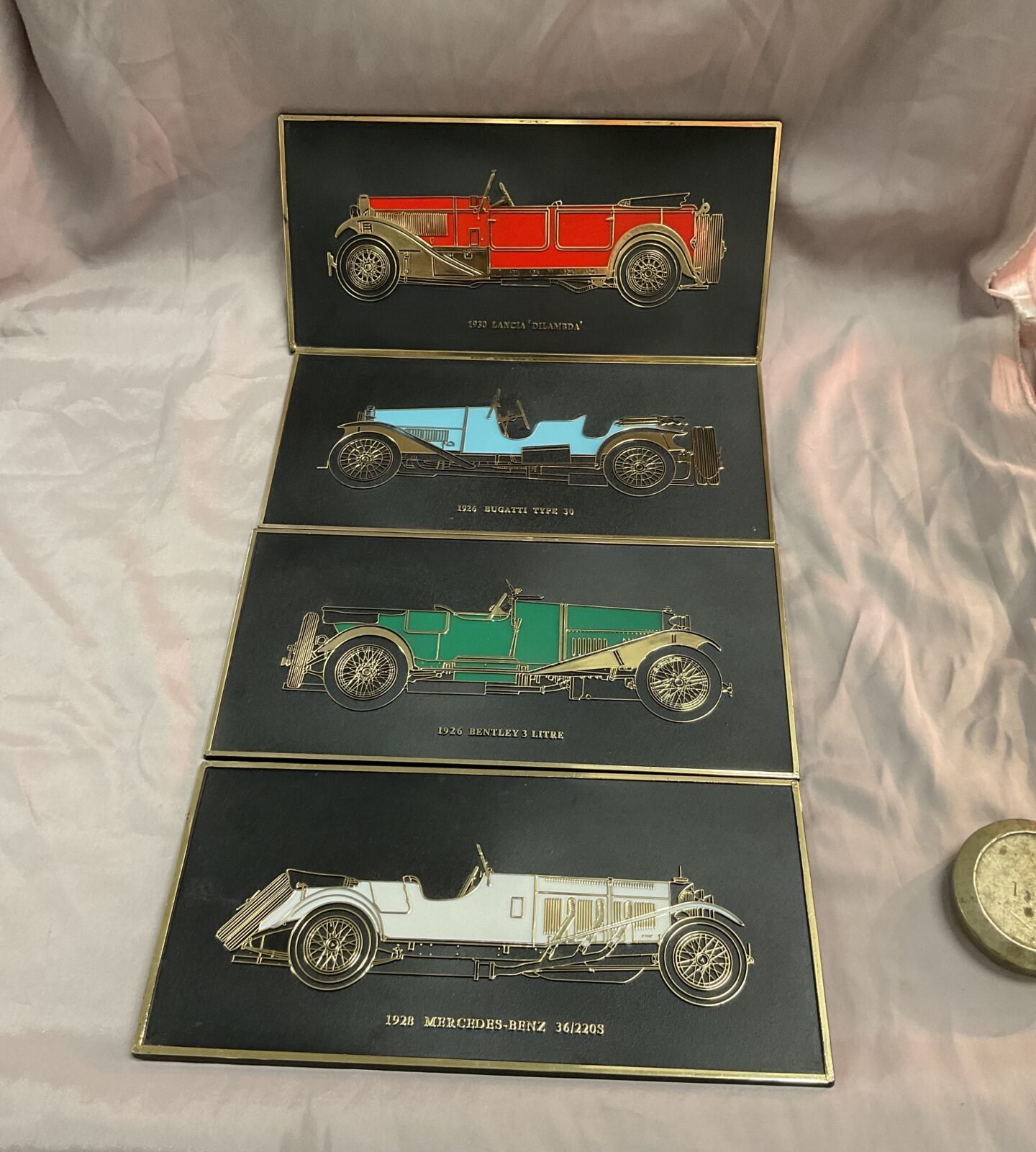 Four Classic car wall plaques Bentley Bugatti lancia and Mercedes
