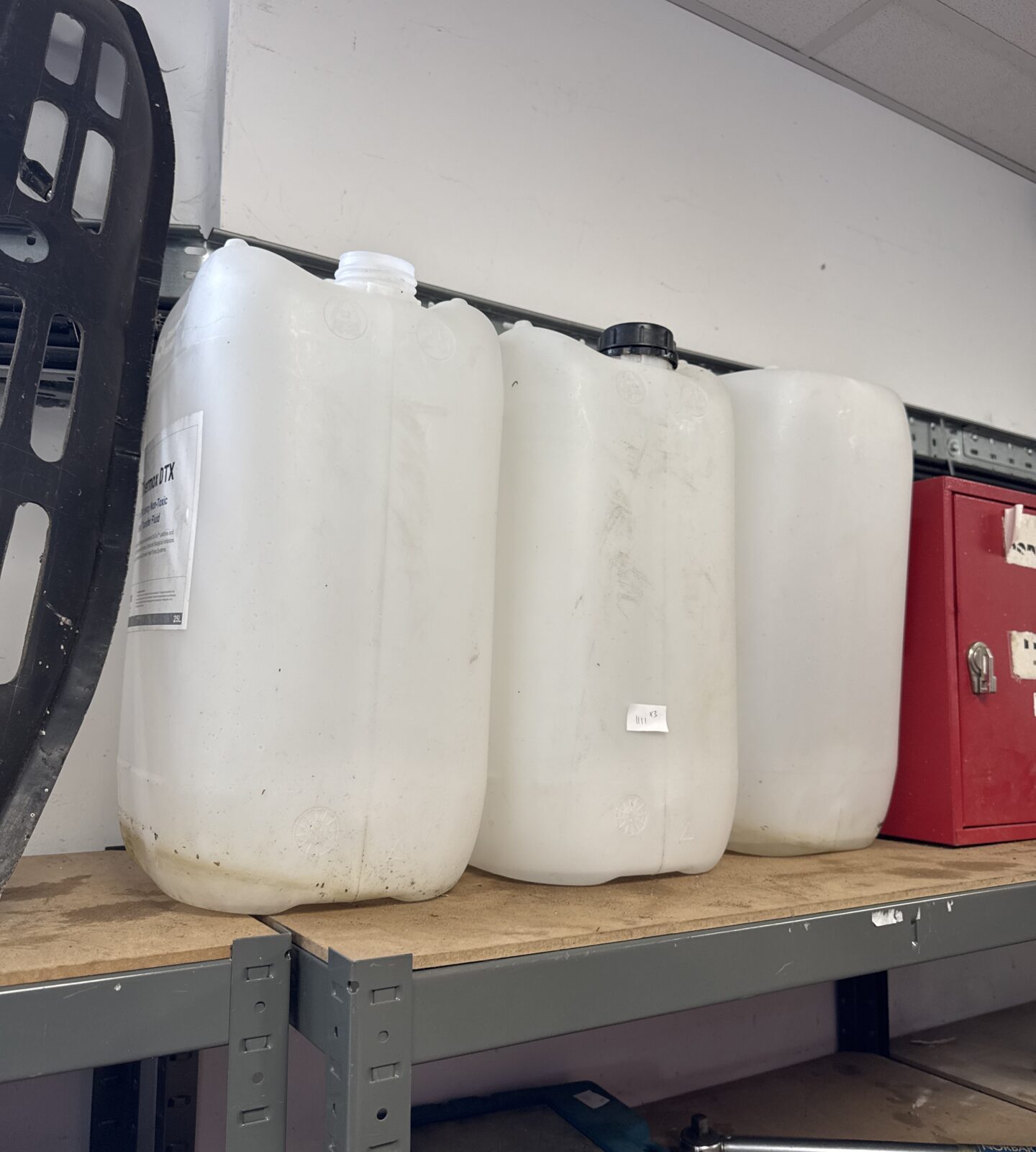 Three 25l water barrels - one missing lid