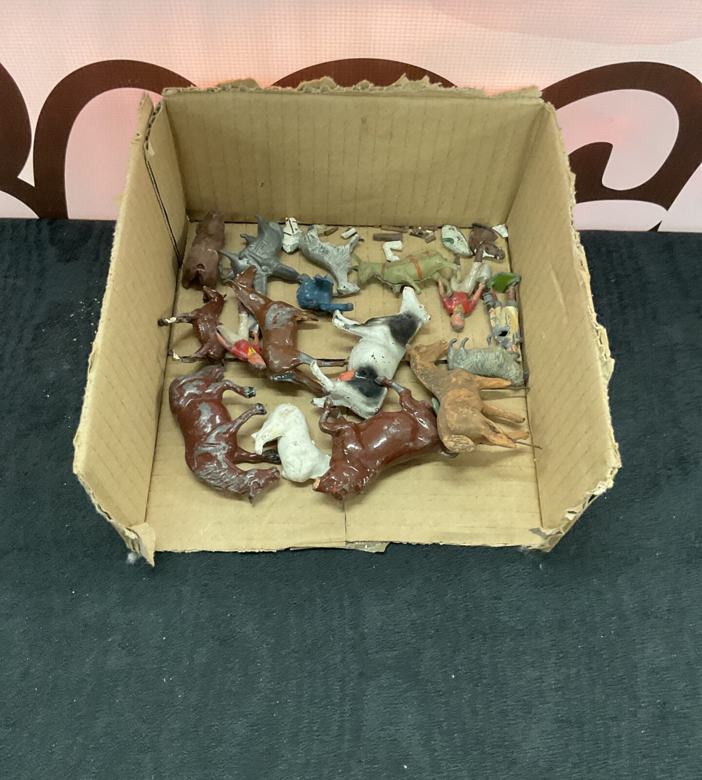 Box of Britains led figures and farm animals